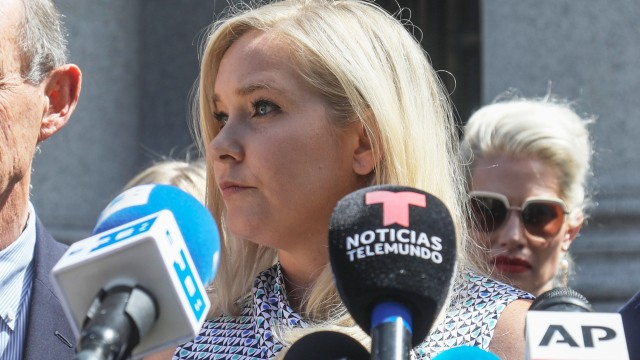 Virginia Giuffre holds a news conference outside a Manhattan court in New York, Aug. 27, 2019.
(Bebeto Matthews / AP Photo)
