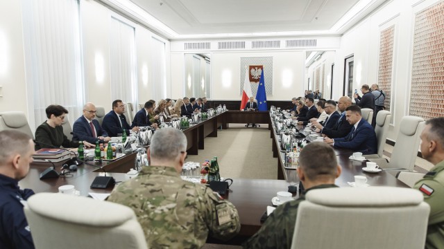 Polish Prime Minister Donald Tusk holds an extraordinary government meeting at the chancellery, with military and emergency services officials, following violations of Polish airspace during a Russian attack, in Warsaw, Poland, Wednesday, Sept. 10, 2025. 
(Chancellery of the Prime Minister of Poland via AP)