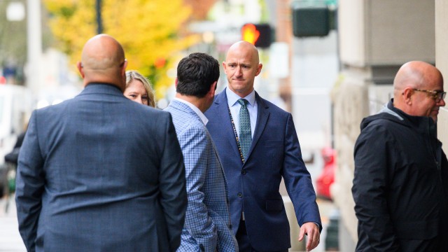 Former Alaska Airlines pilot Joseph Emerson (center) walks into U.S. District Court in Portland, Ore., Monday, Nov. 17, 2025. 
(Molly J. Smith / AP Photo)
