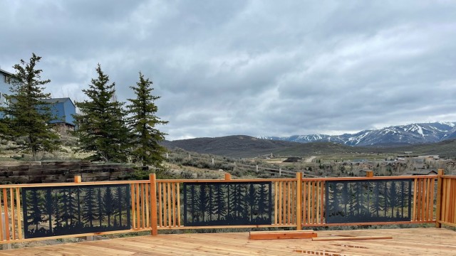 Decorative deck panels, like those shown here on a customer’s deck, are among hand-made products by the FabriPlas Metal shop, launched by a husband and wife team in Bennet, Nebraska. It is among a handful of small manufacturers to be awarded a modernization grant from the Nebraska Department of Labor that’s intended to help boost productivity and workforce development. (Courtesy of FabriPlas Metal)