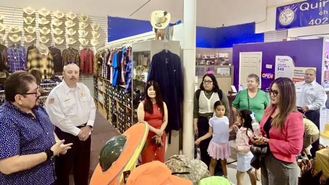 Mayor of Zacapu, Mexico, Mónica Valdez Pulido (in pink jacket on right), tours South Omaha and its Plaza Latina store on the 24th Street commercial corridor, during a visit last week to Nebraska, which marked a donation and new alliance between Columbus, Nebraska, and Zacapu. 
(Courtesy of Plaza Latina)
