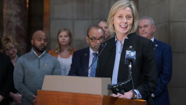 State Sen. Lynne Walz of Fremont, center, leads a news conference in the Nebraska Capitol Rotunda, March 16, 2022.
(Zach Wendling / Nebraska News Service)