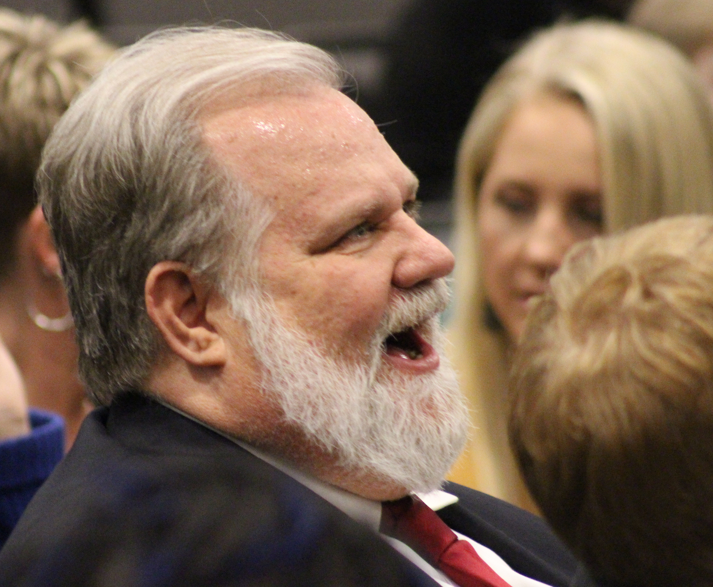 The husband of Mary “Peg” M.Z. Stevens laughs just prior to an investiture ceremony in the Legislative Chambers of the Omaha-Douglas County Civic Center on Friday, Jan. 3, 2020. (Photo by Scott Stewart)