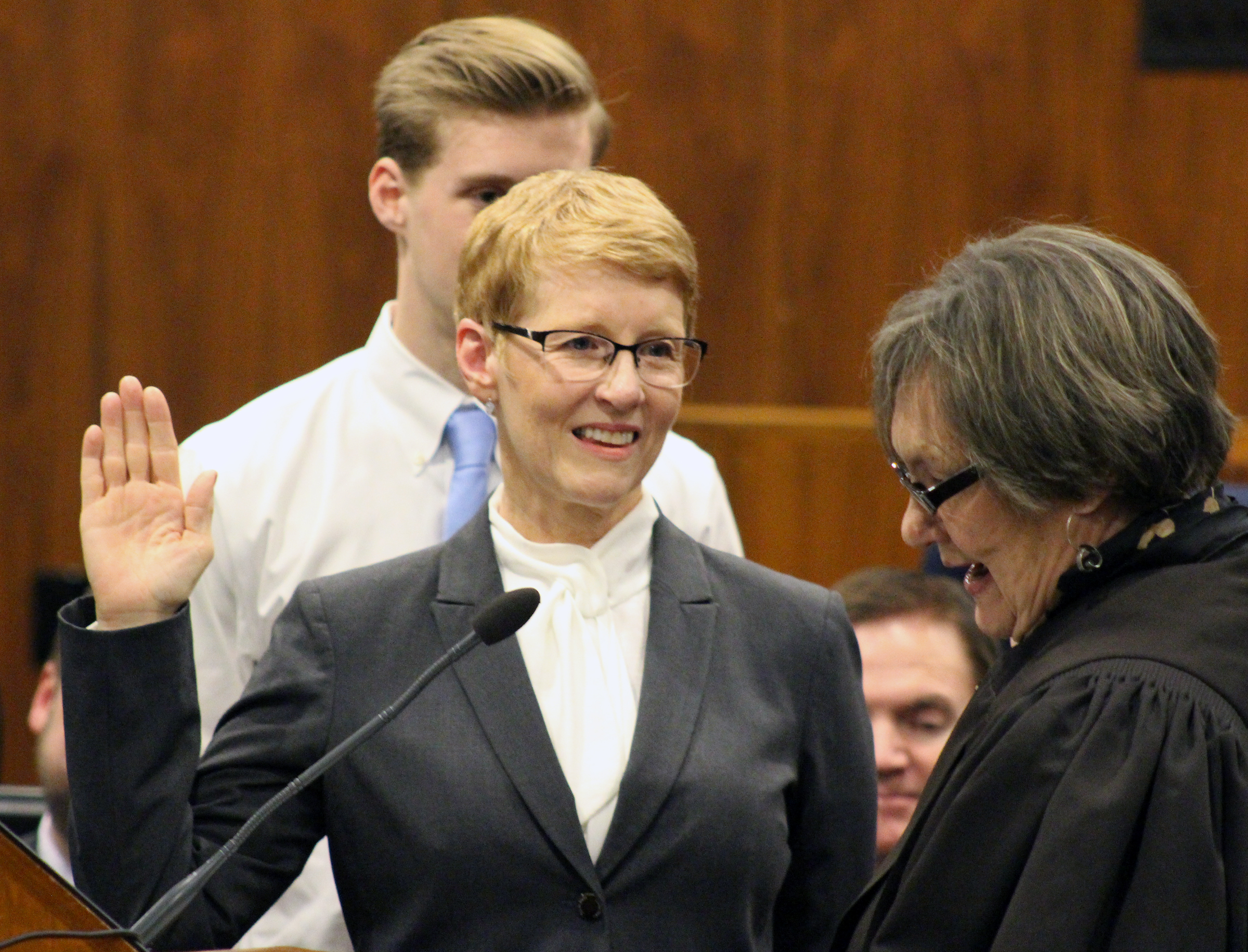 Douglas County Juvenile Court Judge Mary “Peg” M.Z. Stevens takes the oath of office from retired judge Patricia A. Lamberty during an investiture ceremony in the Legislative Chambers of the Oma-ha-Douglas County Civic Center on Friday, Jan. 3, 2020. (Photo by Scott Stewart)