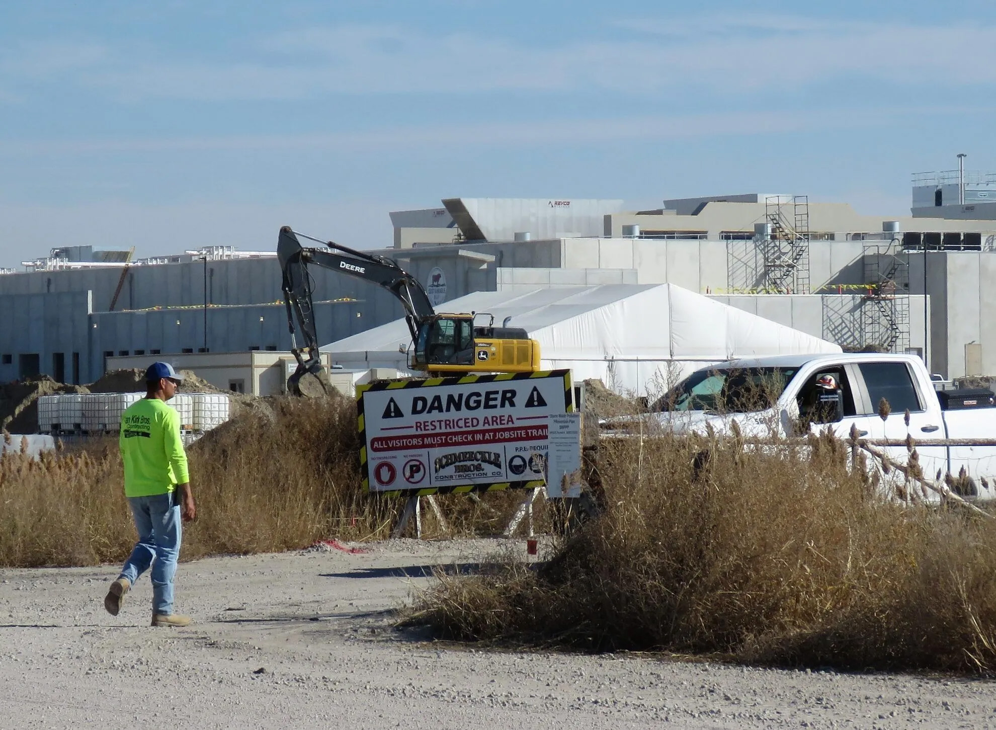 The Sustainable Beef worksite is currently limited to construction workers, and danger signs are posted along the road on the plant’s north side. But the plant will soon be operational and will quickly become one of the city’s biggest employers, bringing an estimated 2,500 people to North Platte, as employees and their families move in to fill the predicted 800 jobs.<br />(Lori Potter / Flatwater Free Press)