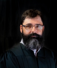 Hon. Travis P. O’Gorman