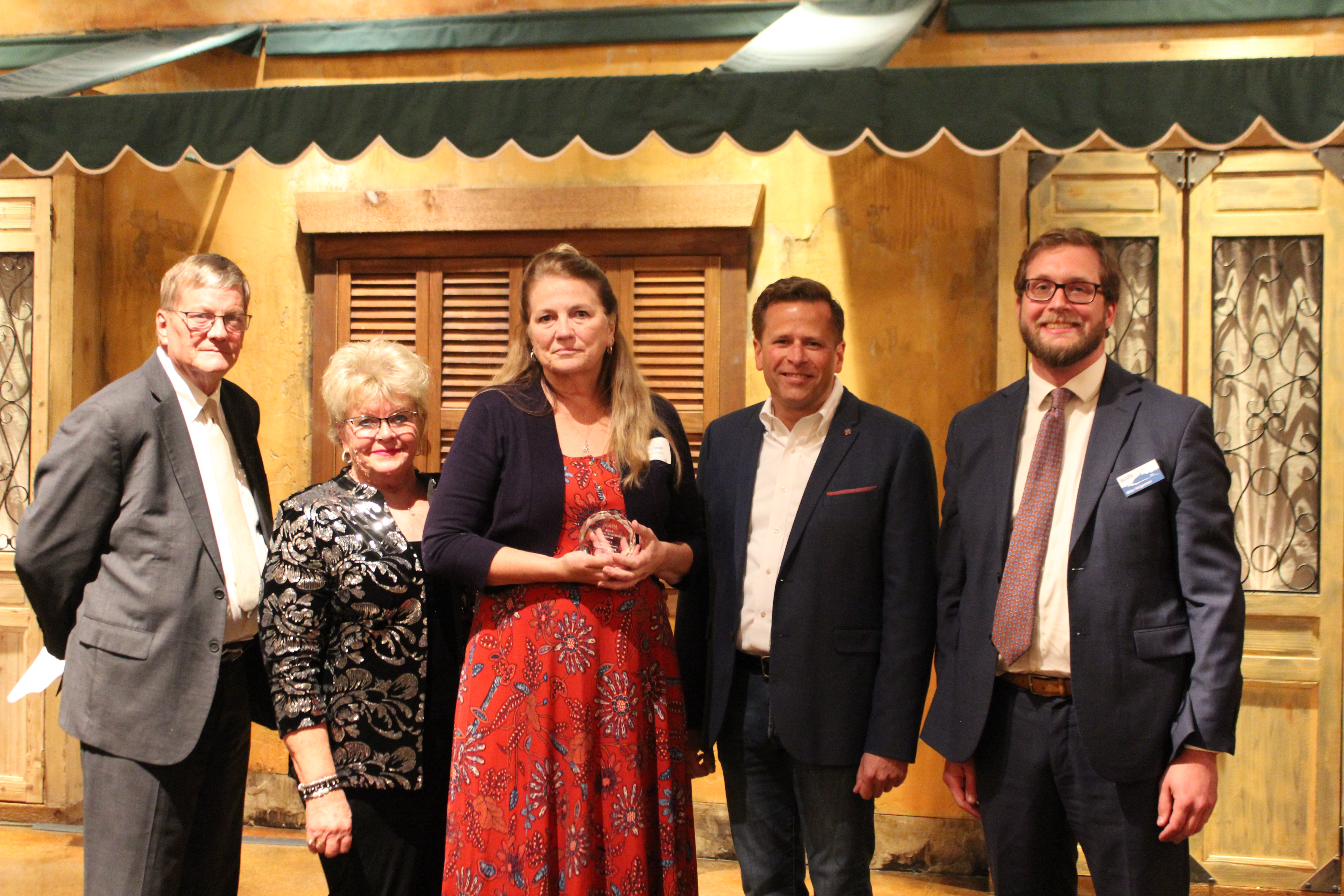 The Regional Citizenship Award honors an individual who recognized regional problems and initiated and supported policies which required a shared regional effort and contributed to the region’s quality of life. Korrena Neppl (center), a flood survivor herself, received this award for her selfless leadership throughout the entire process of helping Pacific Junction recover in the aftermath of the historic 2019 floods. (Courtesy of MAPA)