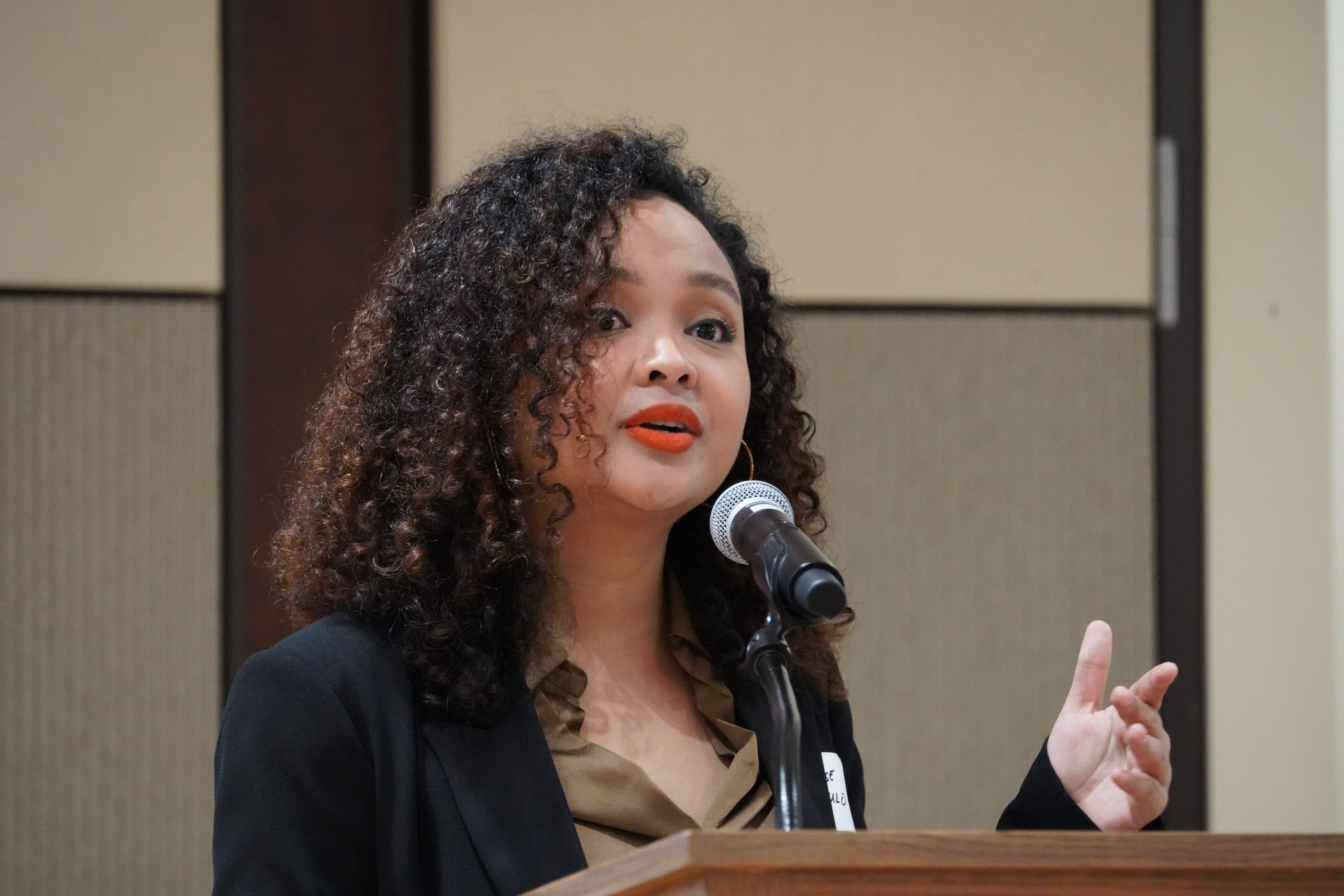 Louise Mabulo gives a speech to a crowd at the Nebraska East Union about her work on the Cacao Project in the Philippines.<br />(Marissa Lindemann / NNS)