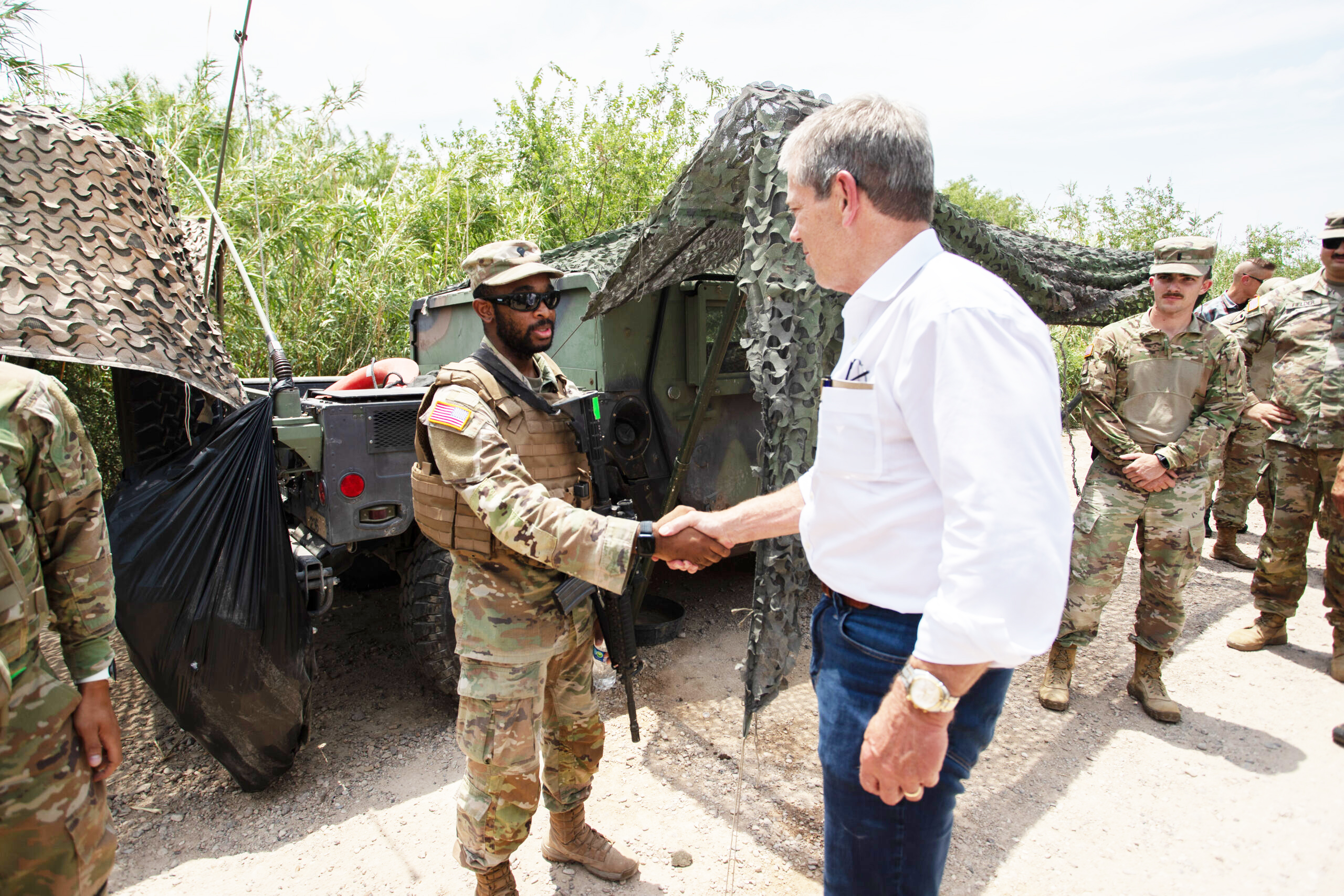 Gov. Jim Pillen at the Texas-Mexico border. He visits with Nebraska National Guard members, whom he deployed to help Texas patrol its border.<br />(Courtesy of the Governor’s Office)