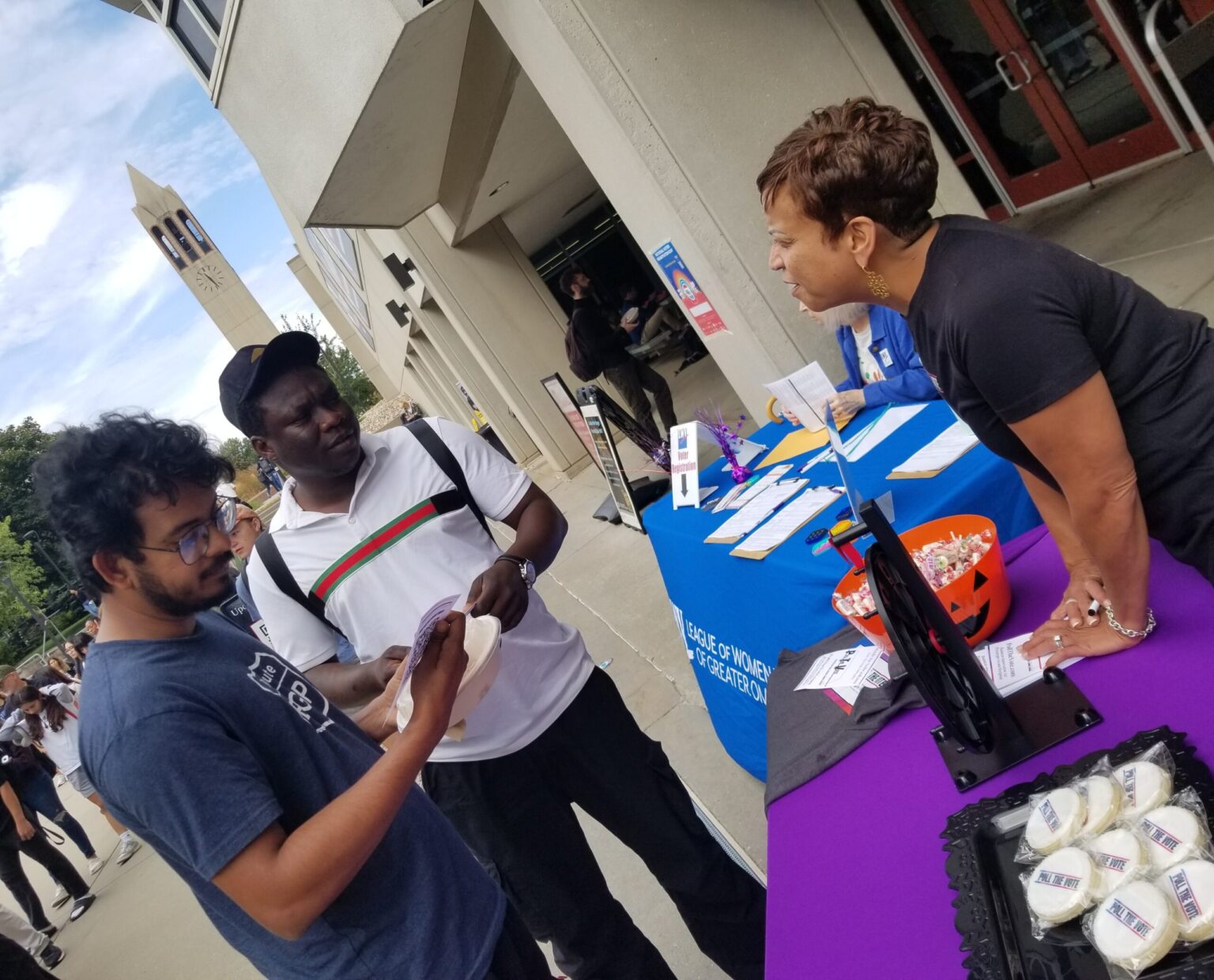 Michella Blankman, team member of Ideologix Insights, provides information about the polling-focused startup to University of Nebraska at Omaha students on National Voter Registration Day.<br />(Courtesy of Ideologix Insights)