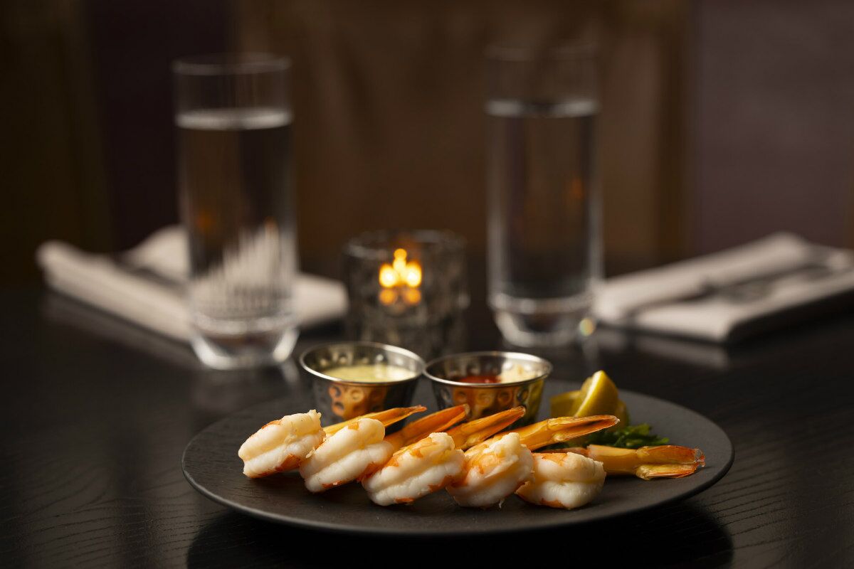 The shrimp cocktail is served with a tarragon aioli, cocktail sauce, horseradish and a seaweed salad.<br />(Ryan Soderlin / Flatwater Free Press)