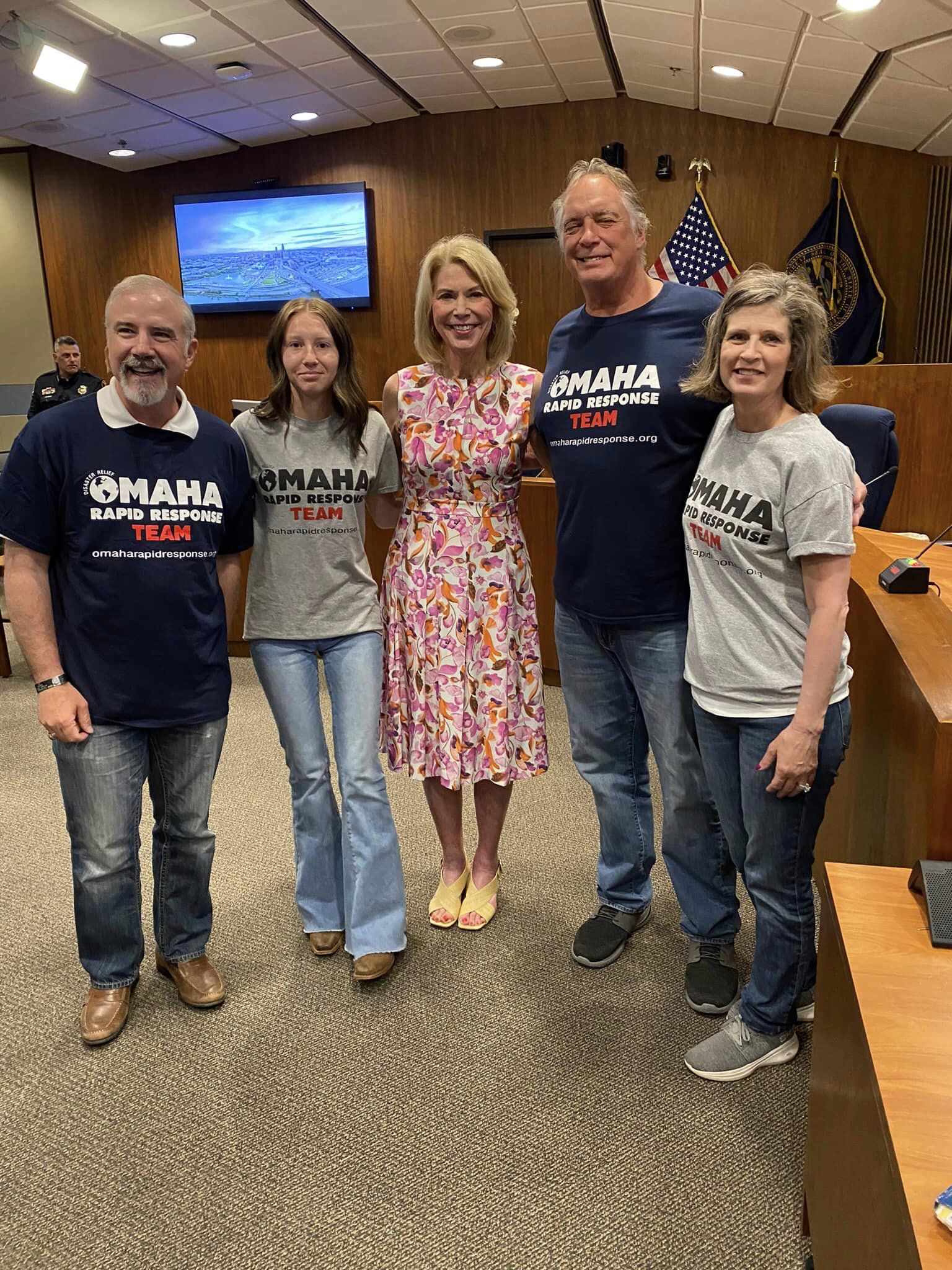 Left to right: Ben “Felix” Ungerman, Director of Field Operations for Omaha Rapid Response, Malia Paben, a volunteer, Mayor Jean Stothert,  the President/CEO of the Omaha Rapid Response Team, Ken Gruber, and Jeri Gruber, Executive Assistant.<br />(Courtesy of Rapid Response Team)
