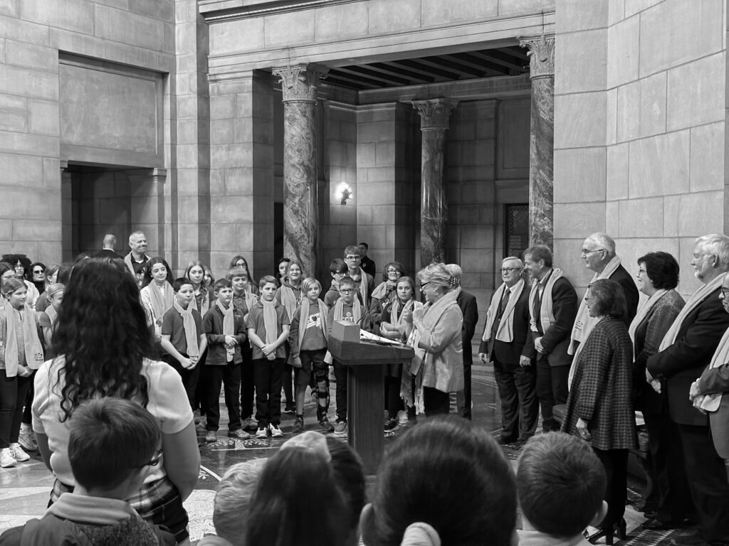 State Sen. Lou Ann Linehan of Omaha speaks to a group of about 85 students from area private schools about her “opportunity scholarship” bill, Legislative Bill 753. (Aaron Sanderford / Nebraska Examiner)