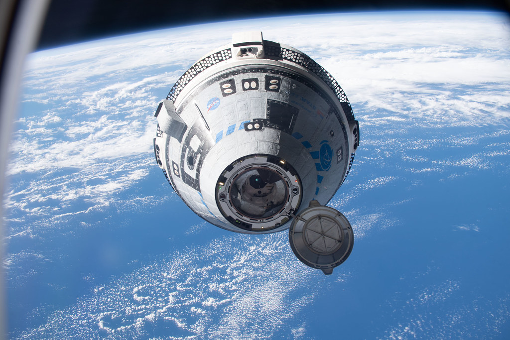 Boeing’s Starliner spacecraft on approach to the International Space Station during an uncrewed test in 2022.<br />(Bob Hine / NASA)