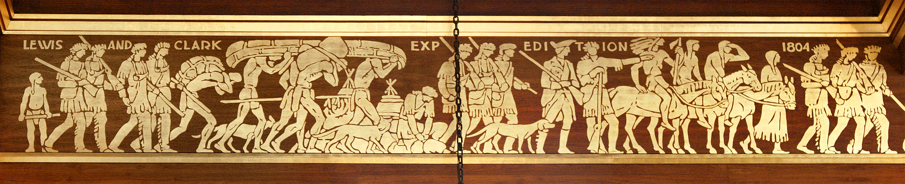 Hildreth Meière’s 250-foot, gold-leaf frieze, along the walnut beams in the House of Representatives, known today as the West Legislative Chamber, depicts the Age of Settlement with the successive appearance of the Spanish, French and Anglo-Americans on Nebraska soil, which includes the Lewis and Clark Expedition in 1804.<br />(International Hildreth Meière Association)