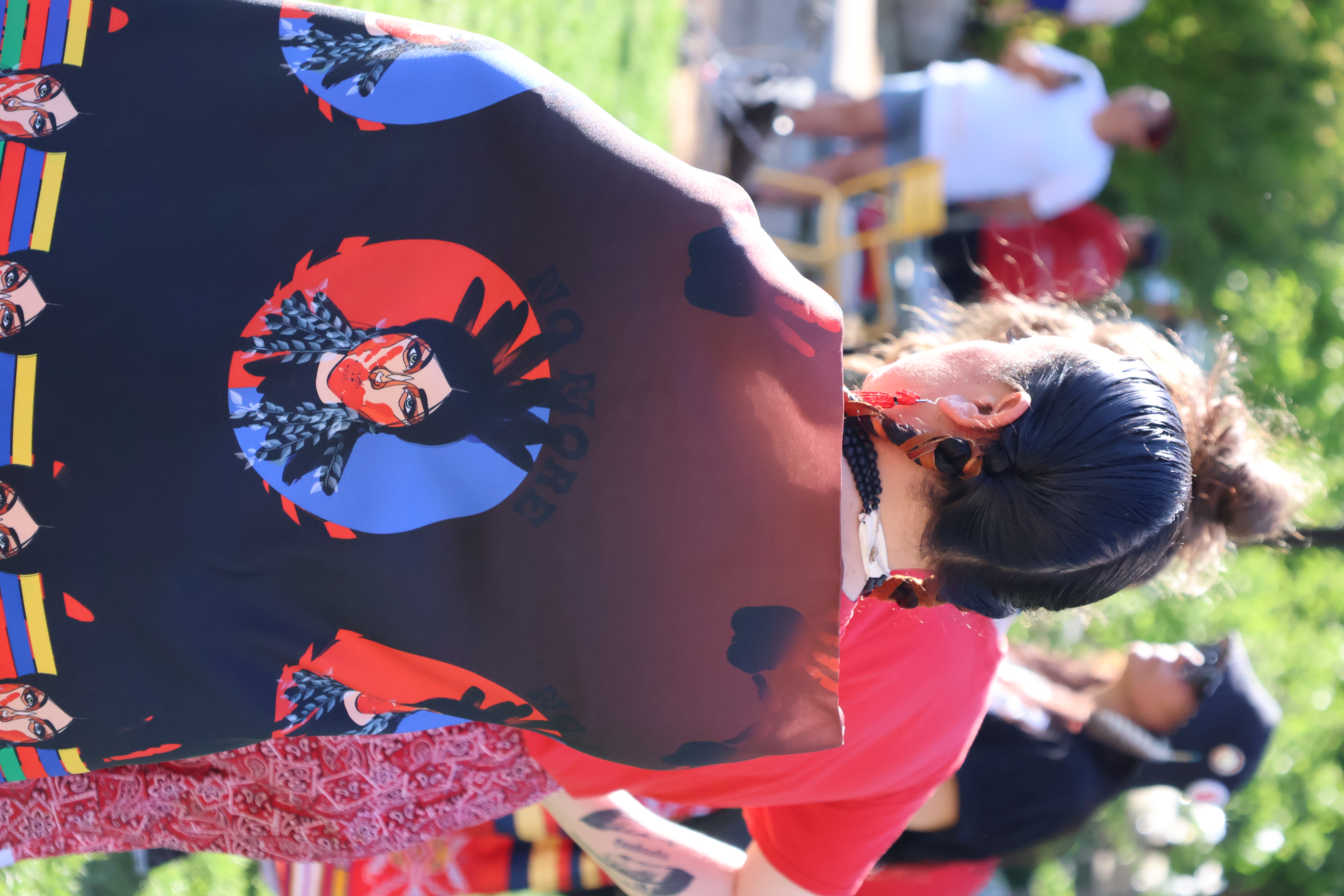 A dancer participating in a round dance wears a shawl honoring Missing and Murdered Indigenous Women.<br /> (Tim Trudell / The Daily Record)
