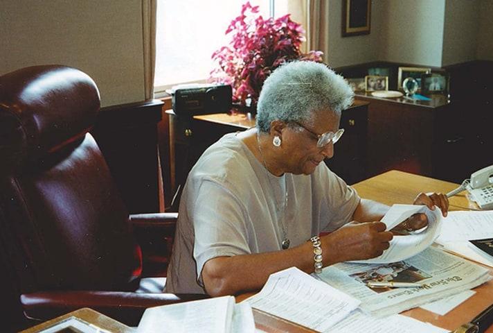 In her later years, Judge Constance Baker Motley works at her desk. (Courtesy Southern District of New York via U.S. Courts)