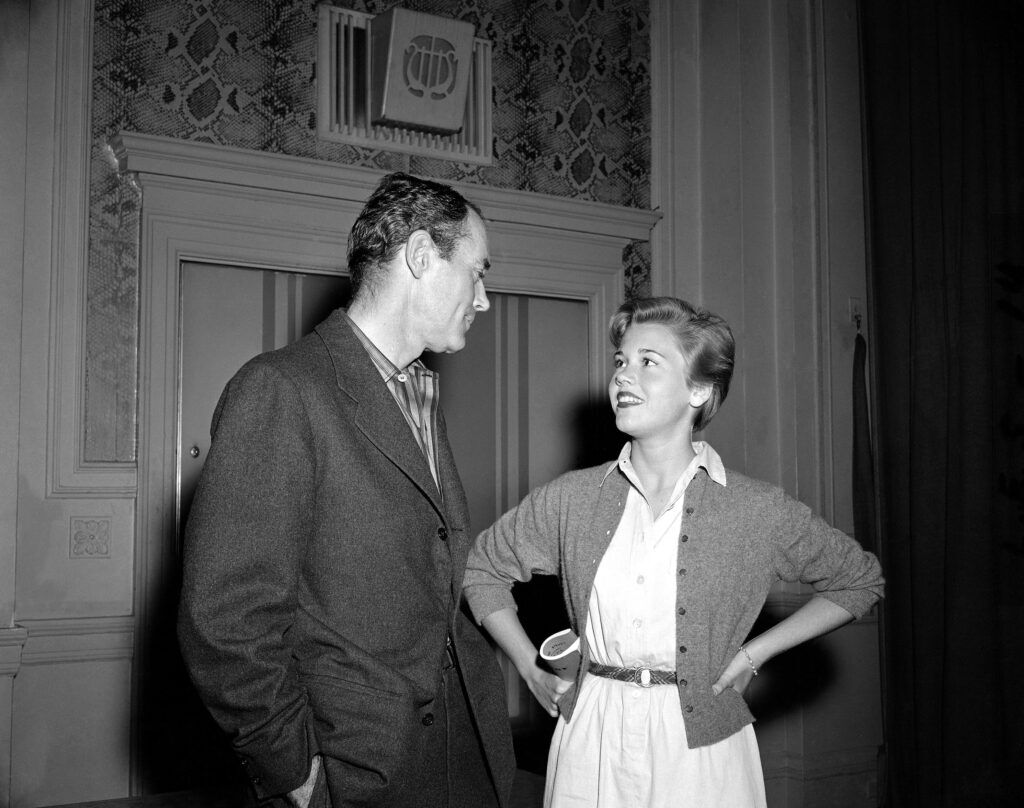 Henry Fonda and his 17-year-old daughter, Jane, take a break during rehearsals for the 1955 Omaha Community Playhouse production of “The Country Girl.”<br />(Les Stoddard / AP Photo)