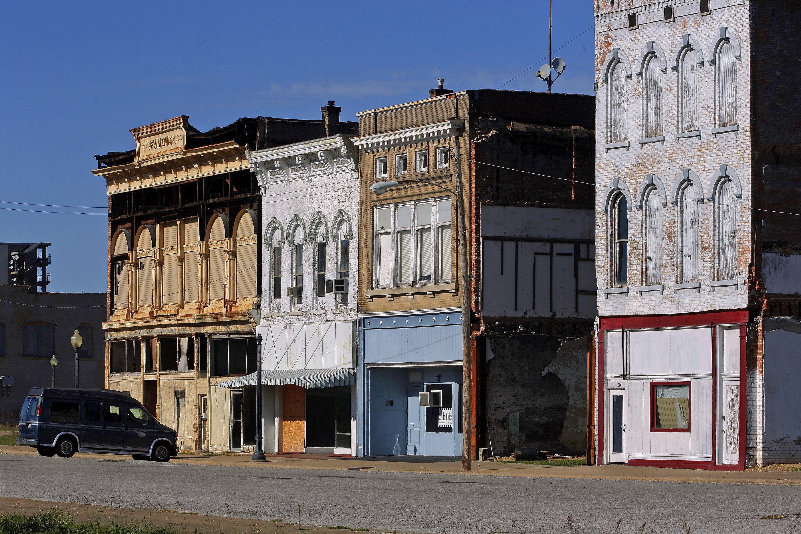 This Oct. 13, 2015 file photo shows abandoned buildings which dominate downtown Cairo, Ill. A federal government plan to tear down public housing complexes in the southern Illinois town of Cairo has sent many families searching for new homes and sparked fears that the once-thriving river city could be coming to an end. (Seth Perlman / AP Photo)