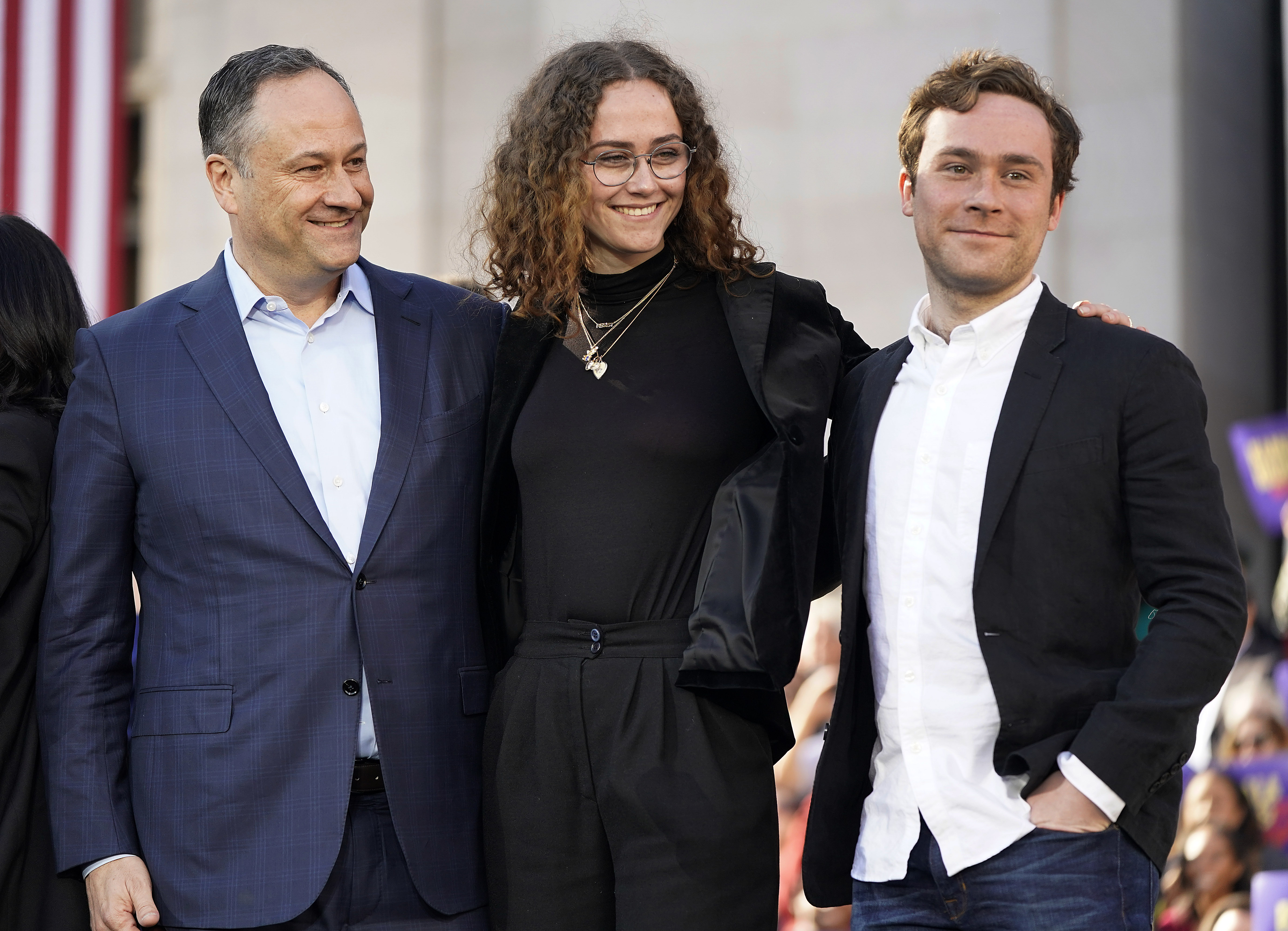 Douglas Emhoff (left) husband of U.S. Vice President, Kamala Harris, and children Ella and Cole, stand on stage after Harris launched her presidential campaign at a rally in her hometown of Oakland, Calif., Sunday, Jan. 27, 2019.<br />(Tony Avelar / AP Photo)