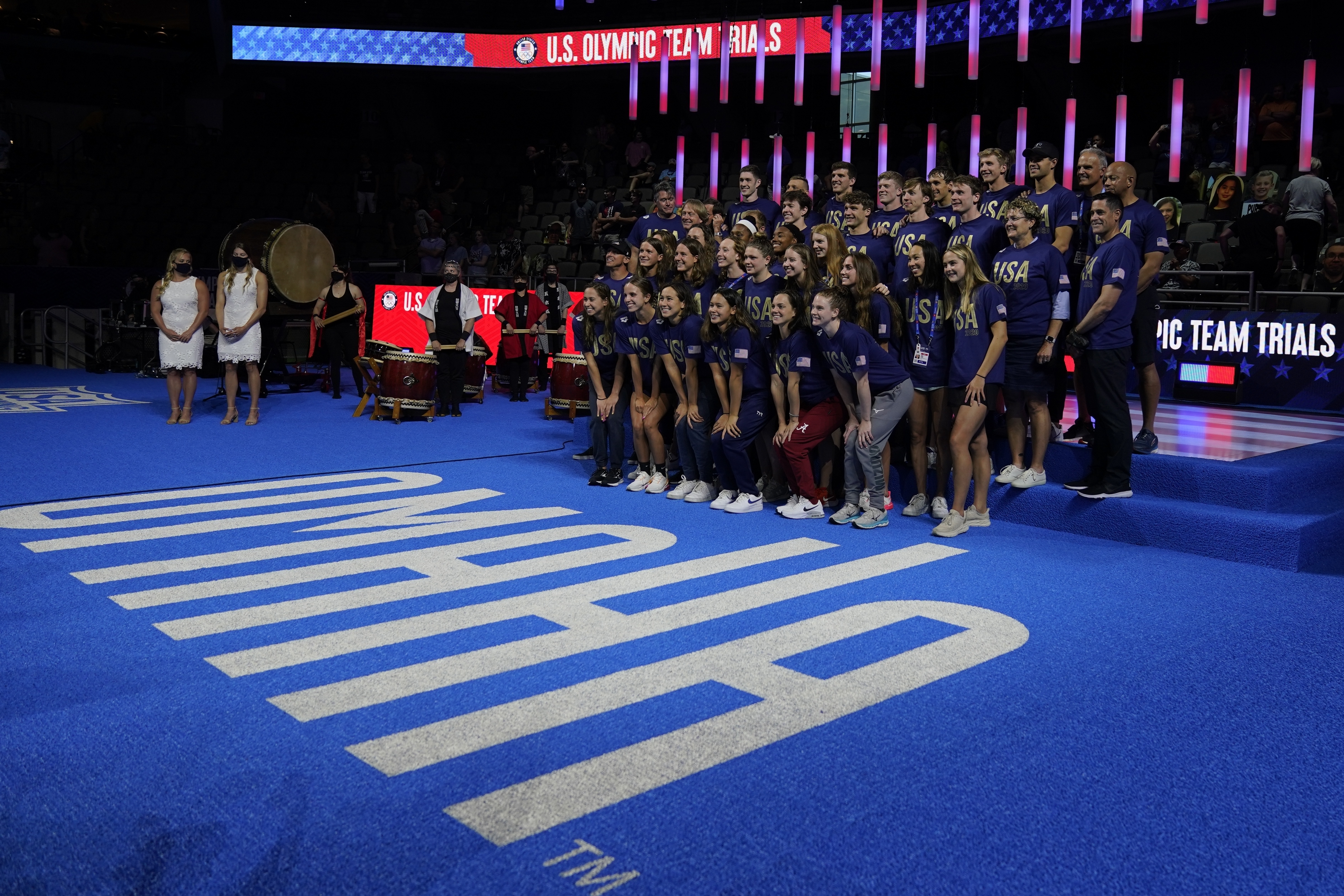 The USA Olympic swim team poses for a picture after the U.S. Olympic Swim Trials on Sunday, June 20, 2021, in Omaha, Neb. The next U.S. Olympic swimming team will be determined in a football stadium. USA Swimming announced Tuesday, March 29, 2022 that its trials for the 2024 Paris Games will be held at Lucas Oil Stadium, the massive home of the NFL’s Indianapolis Colts. (Jeff Roberson / AP Photo)