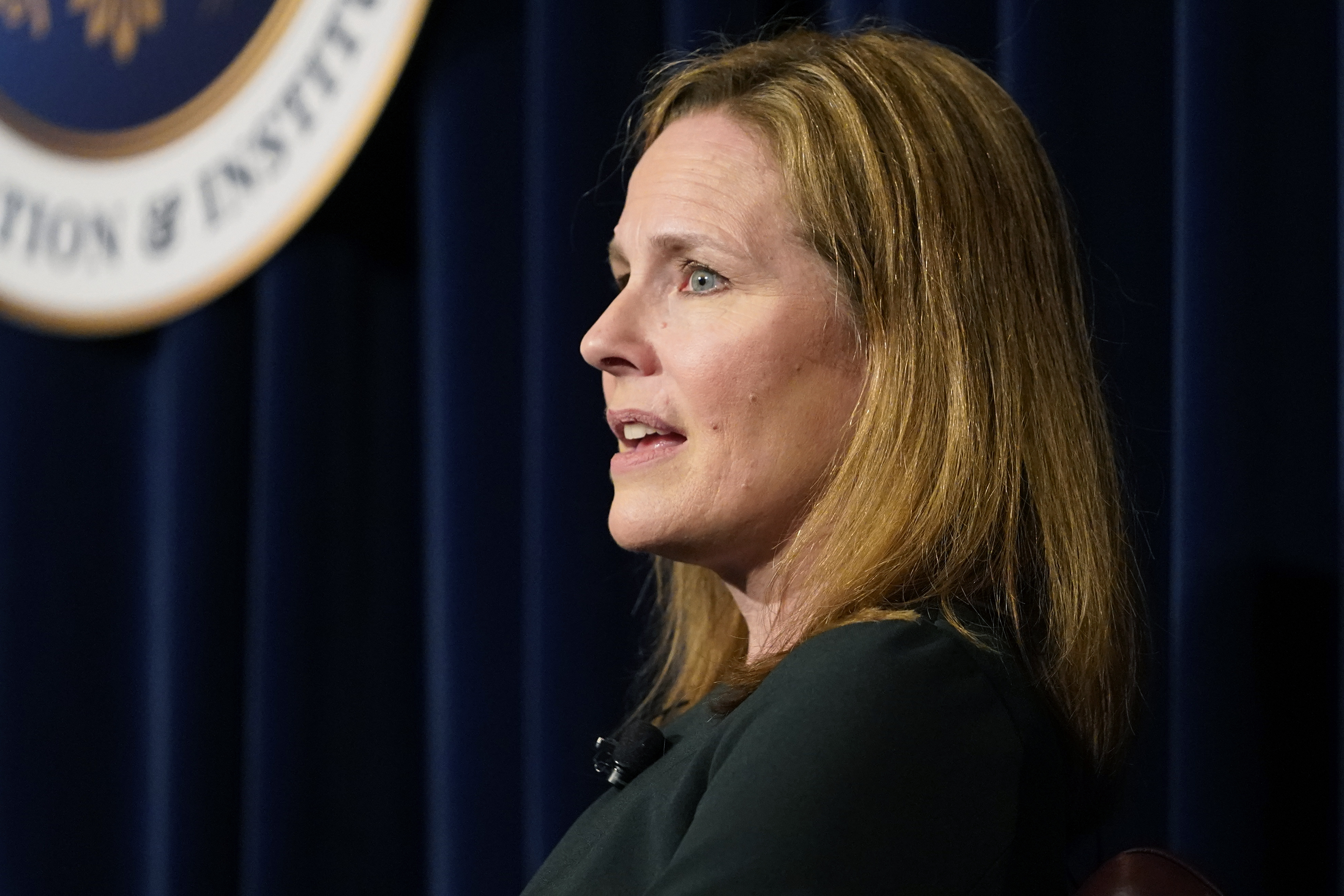 Amy Coney Barrett (Damian Dovarganes and Jeff Roberson / AP Photo)