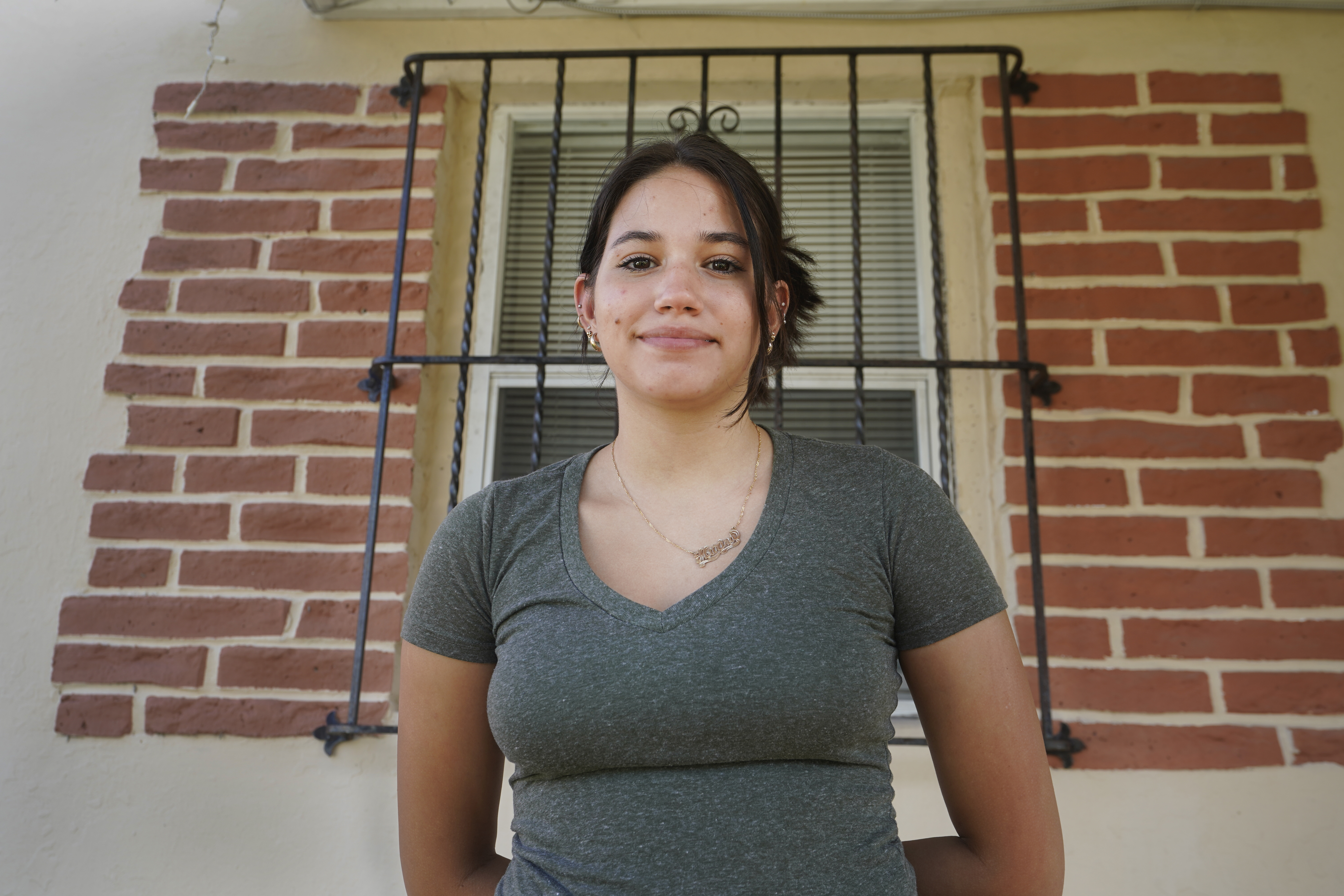 Adismarys Abreu, 16, poses for a photo at her home, Tuesday, Aug. 23, 2022, in Miami. Abreu had been discussing a long-lasting birth control implant with her mother for about a year as a potential solution to increasing menstrual pain. Then Roe v. Wade was overturned, and Abreu joined the throng of teens rushing to their doctors as states began to ban or severely limit abortions.<br />(Wilfredo Lee / AP Photo)