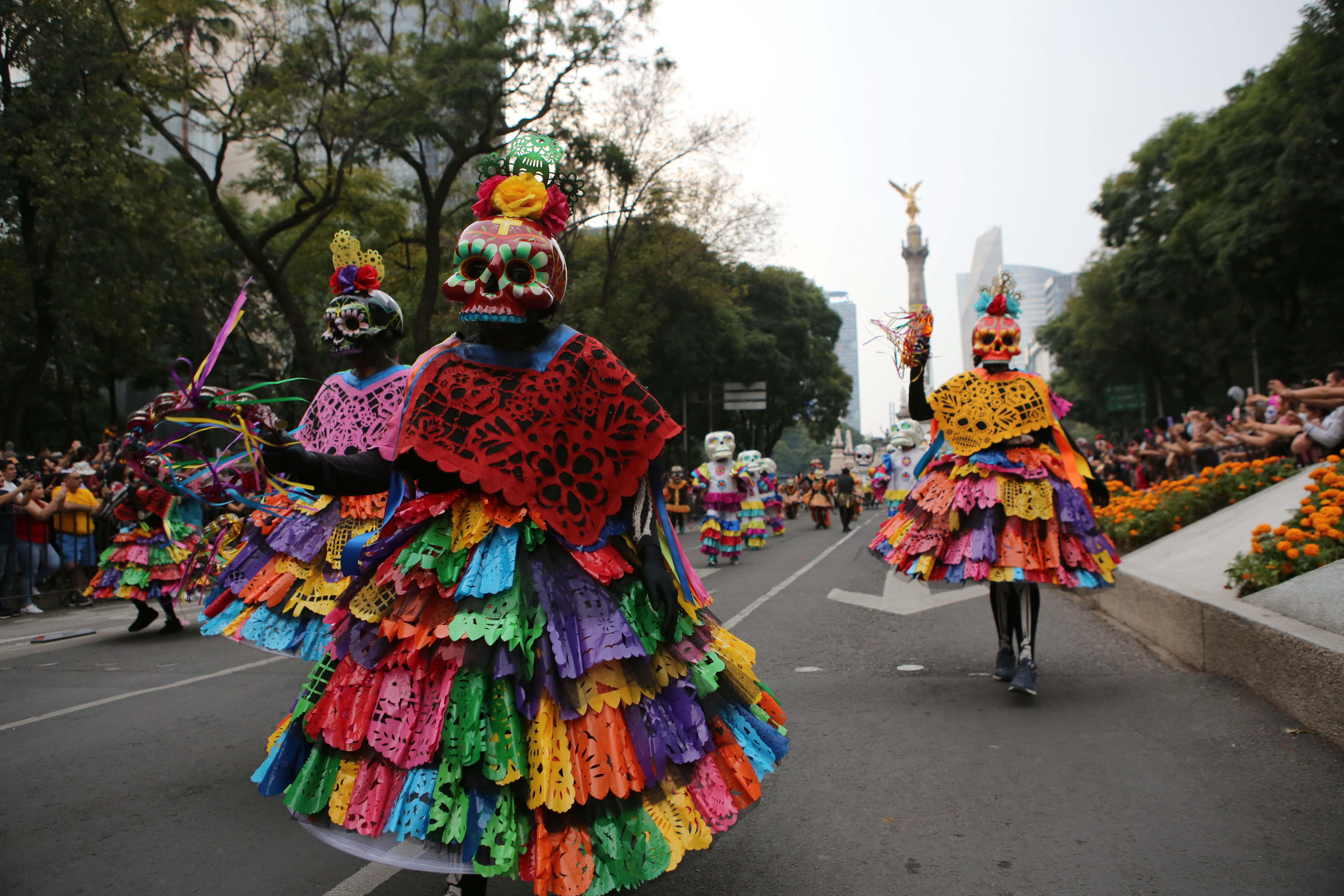 Costumed participants march in the Day of the Dead parade in Mexico City, Saturday, Oct. 29, 2022.<br />(Ginnette Riquelme / AP Photo)