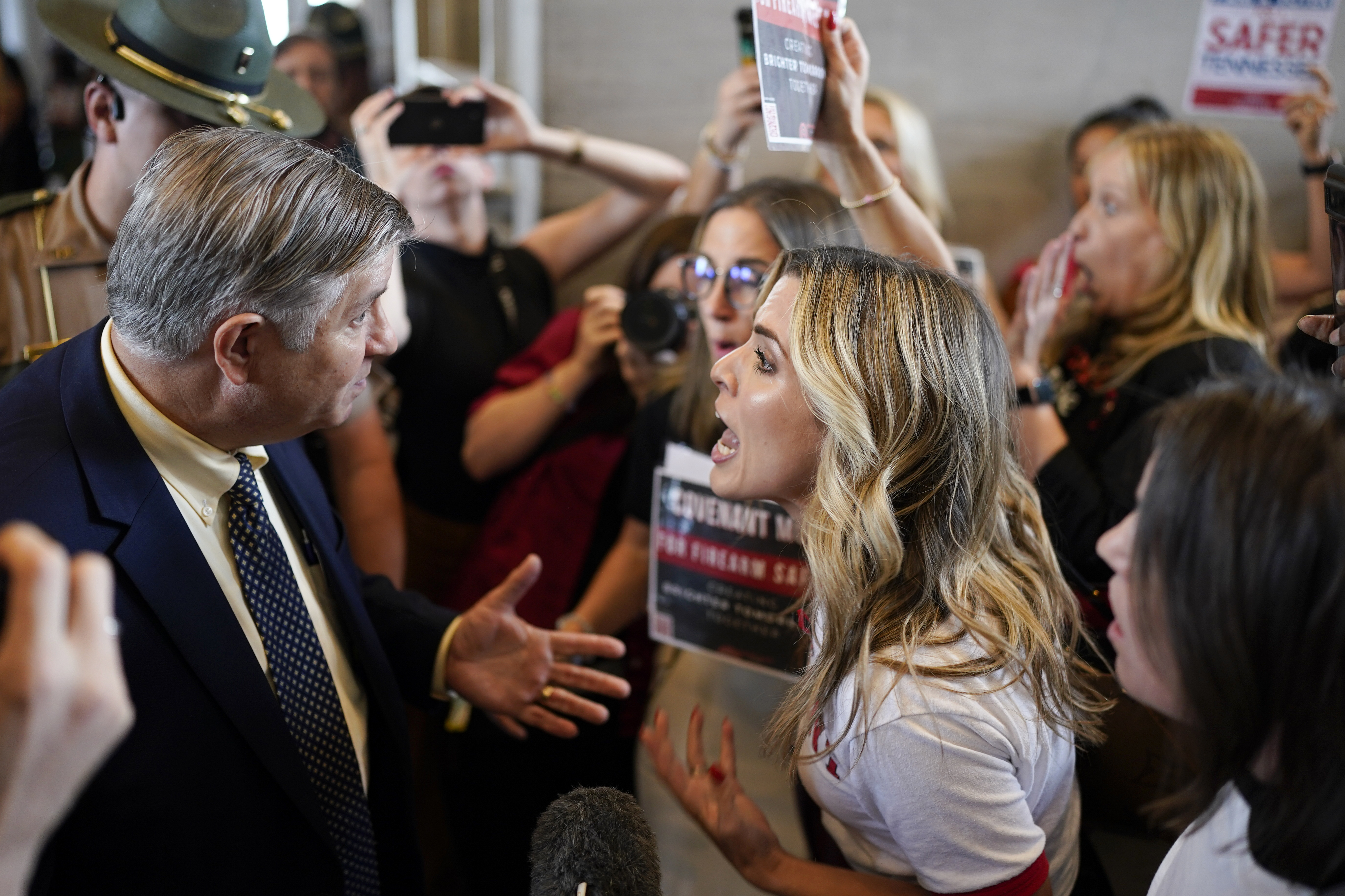 Johnny Ellis (left) argues over gun law reform with Covenant School parent Mary Joyce outside the House chamber after a special session of the state legislature on public safety adjourned Tuesday, Aug. 29, 2023, in Nashville, Tenn.<br />(George Walker IV / AP Photo)