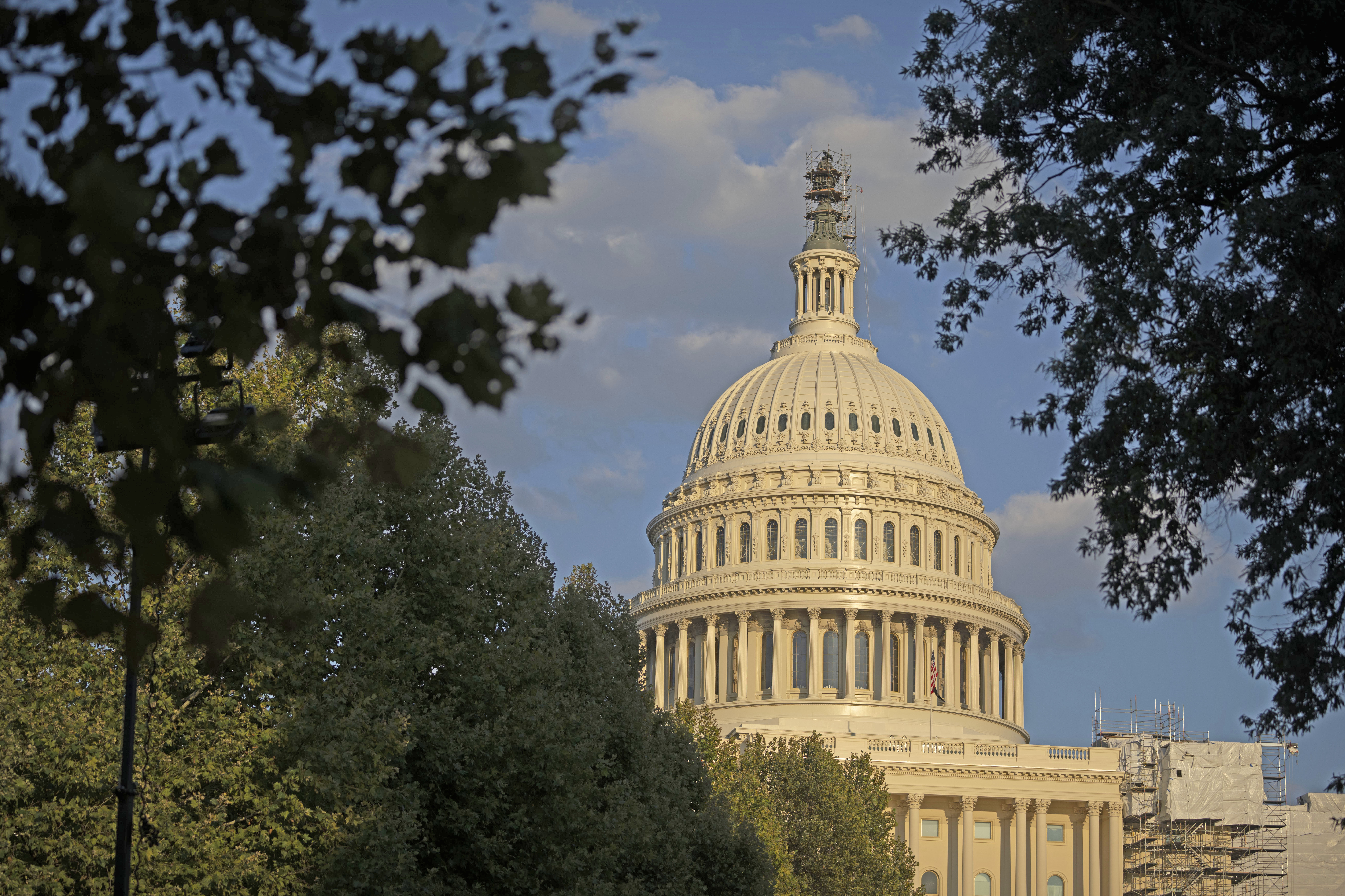 The late-day sun shines on the U.S. Capitol building on Wednesday, Sept. 20, 2023, in Washington. (Mark Schiefelbein / AP Photo)