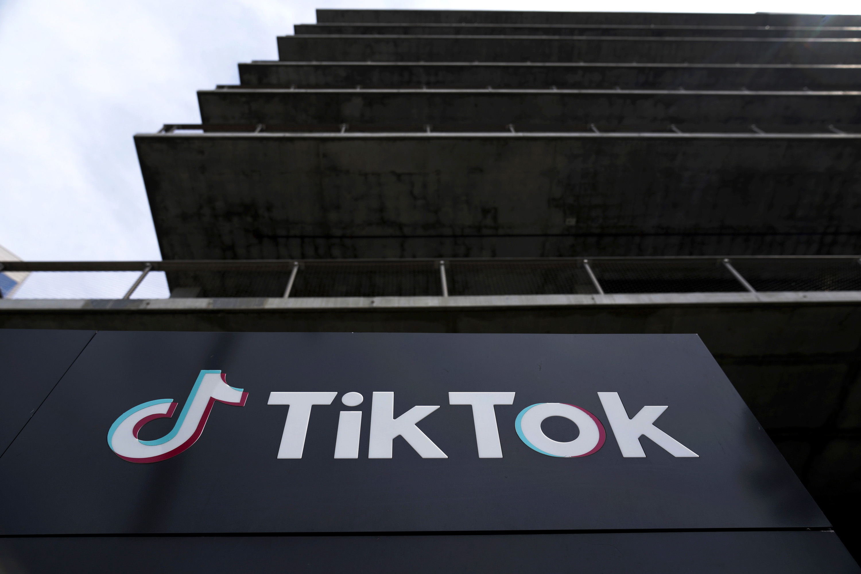 A TikTok sign is displayed on their building in Culver City, Calif., March 11, 2024. TikTok said Thursday, May 23, its putting in place new rules to limit the reach of state-affiliated media accounts.<br />(Damian Dovarganes / AP Photo)