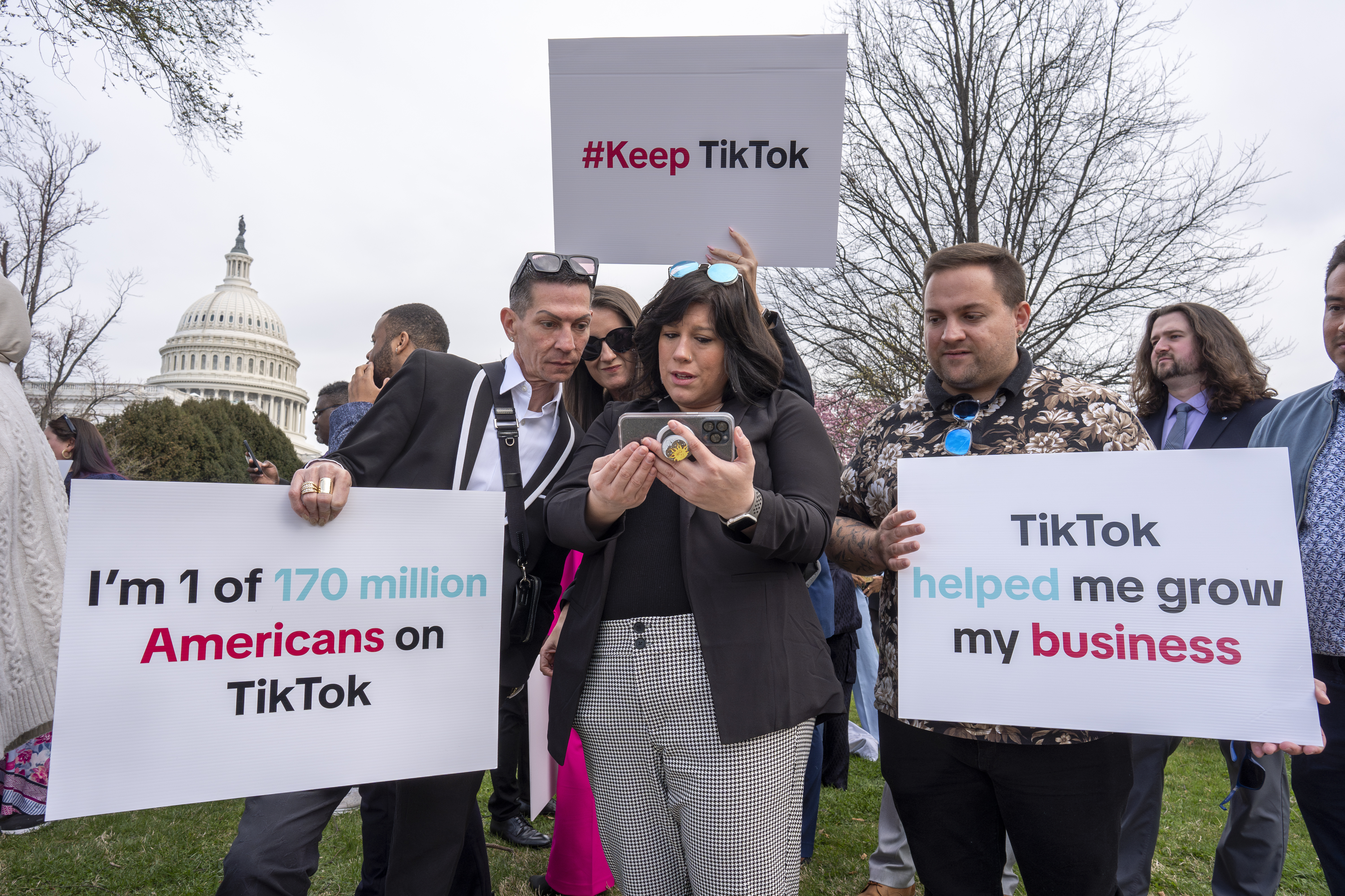Devotees of TikTok monitor voting at the Capitol in Washington, as the House passed a bill that would lead to a nationwide ban of the popular video app if its China-based owner doesn&#039;t sell, Wednesday, March 13, 2024.<br />(J. Scott Applewhite / AP Photo)