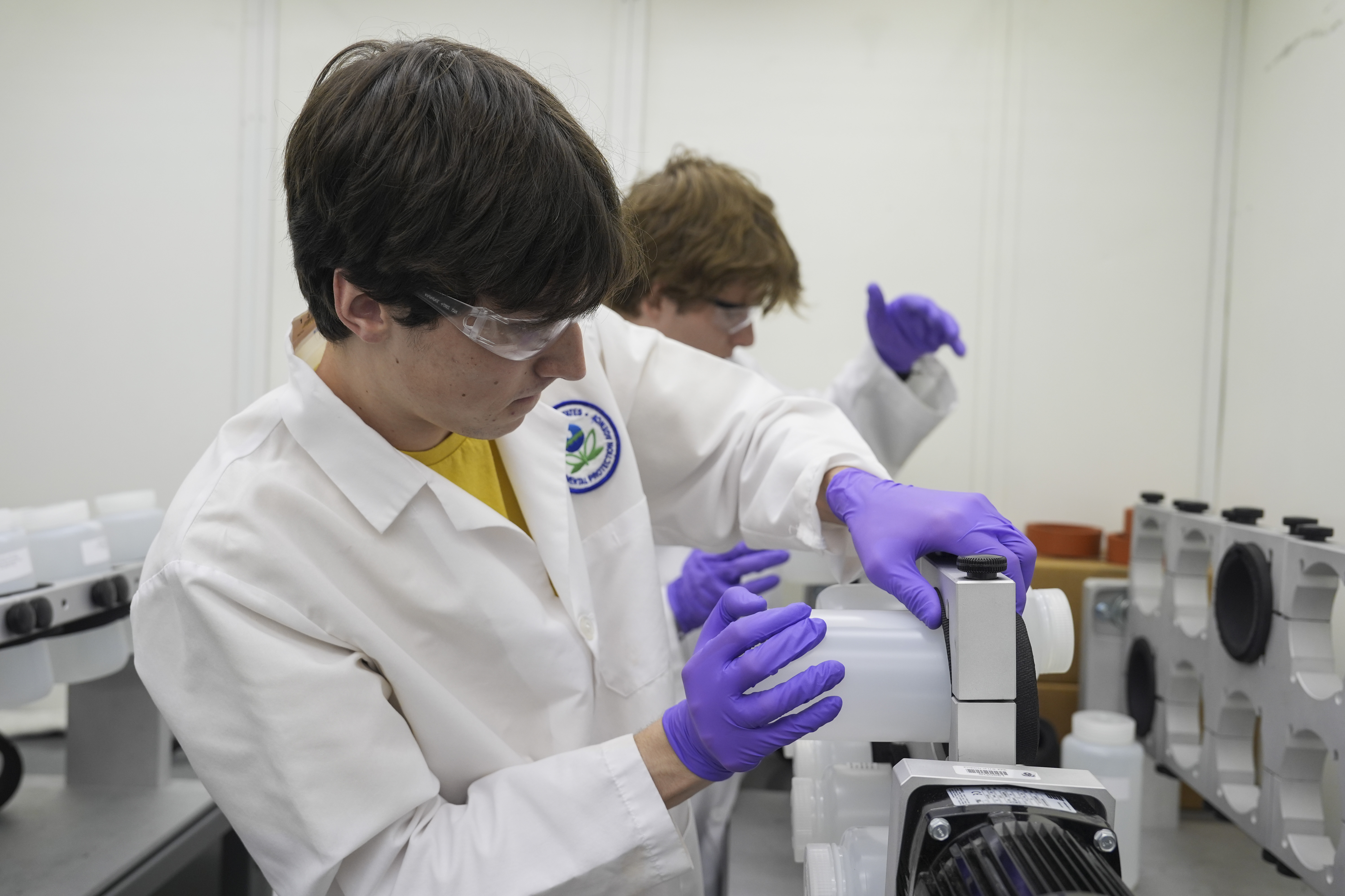 Jackson Quinn tests  for PFAS, or the so-called “forever chemicals” in drinking water Wednesday, April 10, 2024, at a U.S. Environmental Protection Agency lab in Cincinnati.<br />(Joshua A. Bickel / AP Photo)