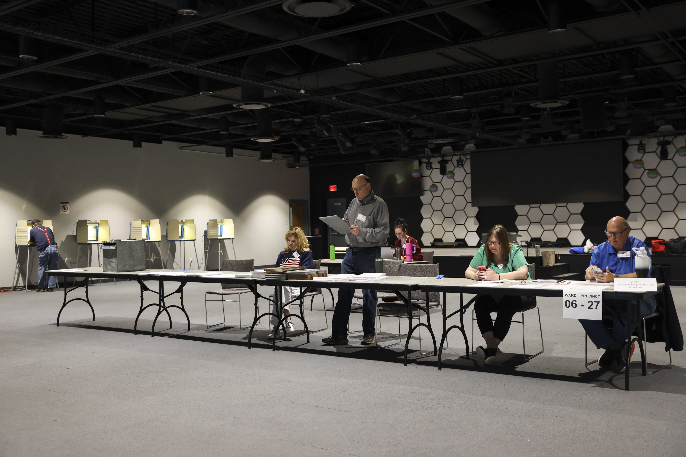 Election workers wait for voters to arrive at Relevant Community Church to vote in the Nebraska primary election, Tuesday, May 14, 2024, in Omaha, Neb.<br />(Nikos Frazier / Omaha World-Herald via AP)
