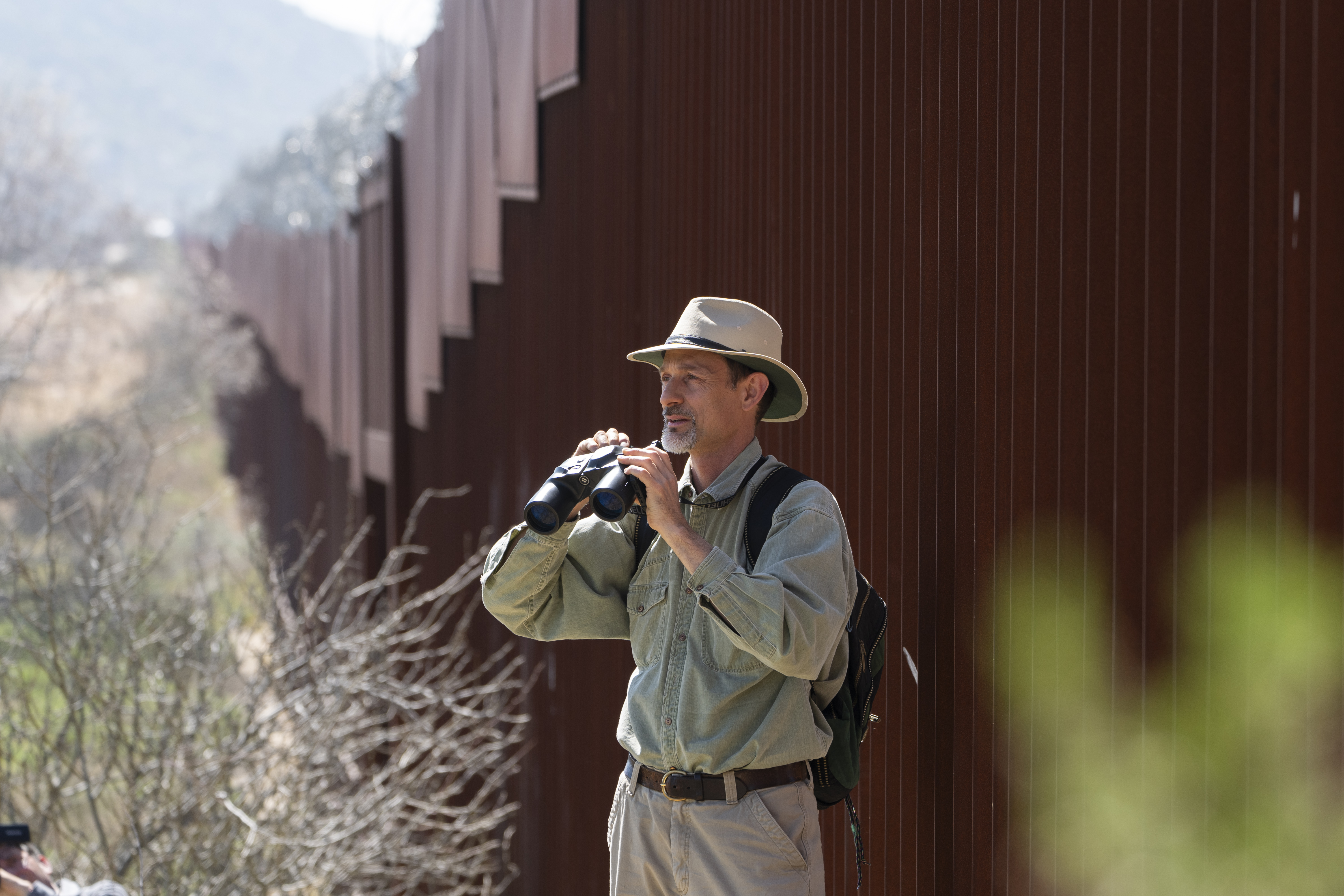 Dr. Georges Seingier, Prof. Marine and Environmental Sciences at Baja California Autonomous University leads a botanical expedition with Universidad Autonoma de Baja California botanists and citizen scientists to document native plants along the U.S.-Mexico border.<br />(Damian Dovarganes / AP Photo)