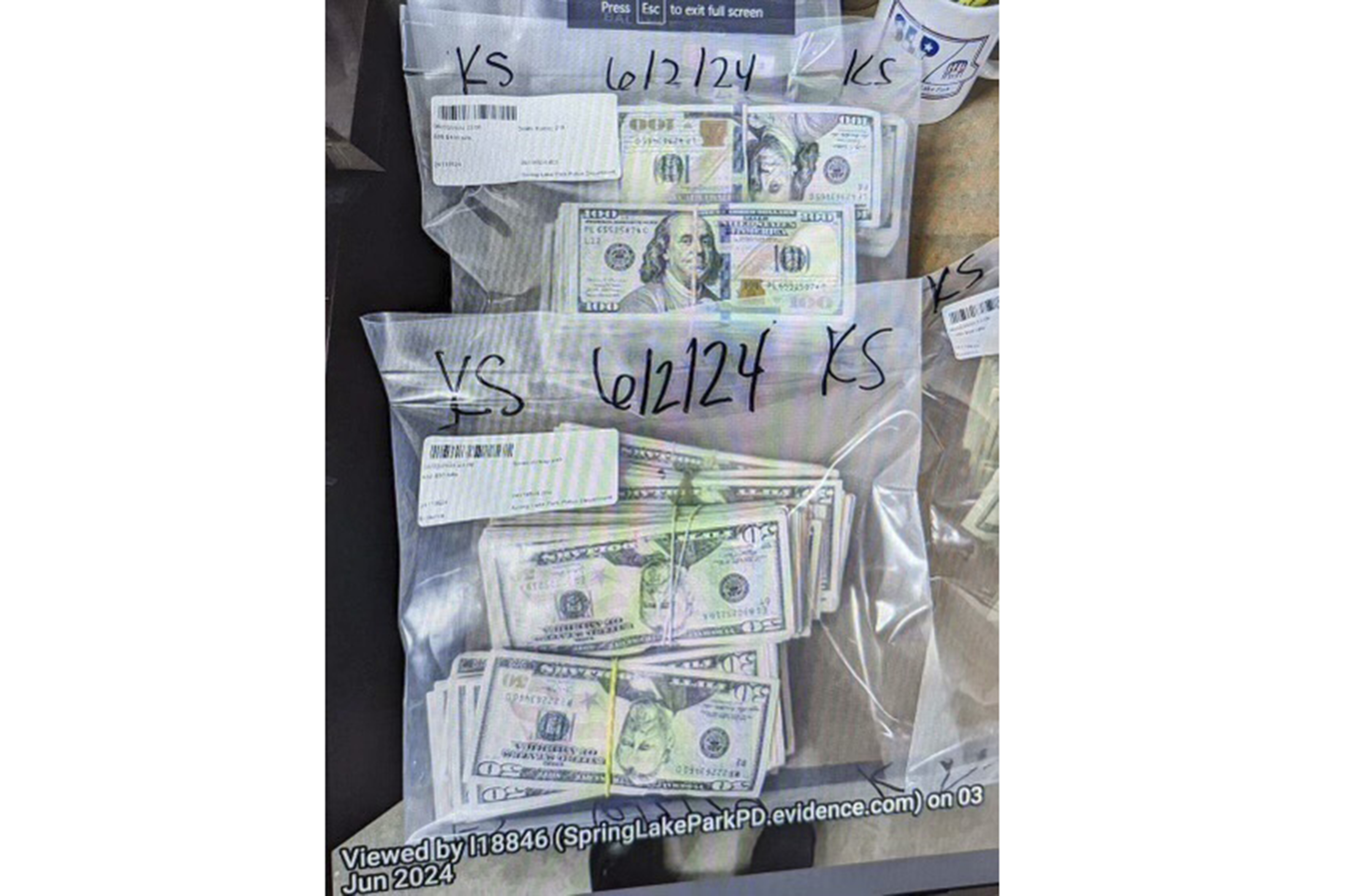 These photos supplied by the U.S. Attorney&#039;s Office for Minnesota show cash and a bag that was left at the home of a juror in a massive fraud case, June 2, 2024, outside Minneapolis, Minn. Authorities have confiscated cellphones and taken all seven defendants into custody as investigators try to determine who attempted to bribe the juror to acquit them on charges of stealing more than $40 million from a program meant to feed children during the pandemic.<br />(U.S. Attorney&#039;s Office for Minnesota via AP)