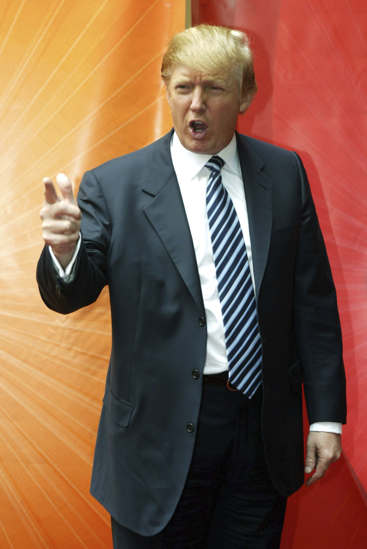 Donald Trump, who starred in NBC&#039;s &quot;The Apprentice,&quot; strikes his classic &quot;You&#039;re fired&quot; pose as he arrives at Radio City Music Hall May 16, 2005, in New York.<br />(Mary Altaffer / AP Photo)