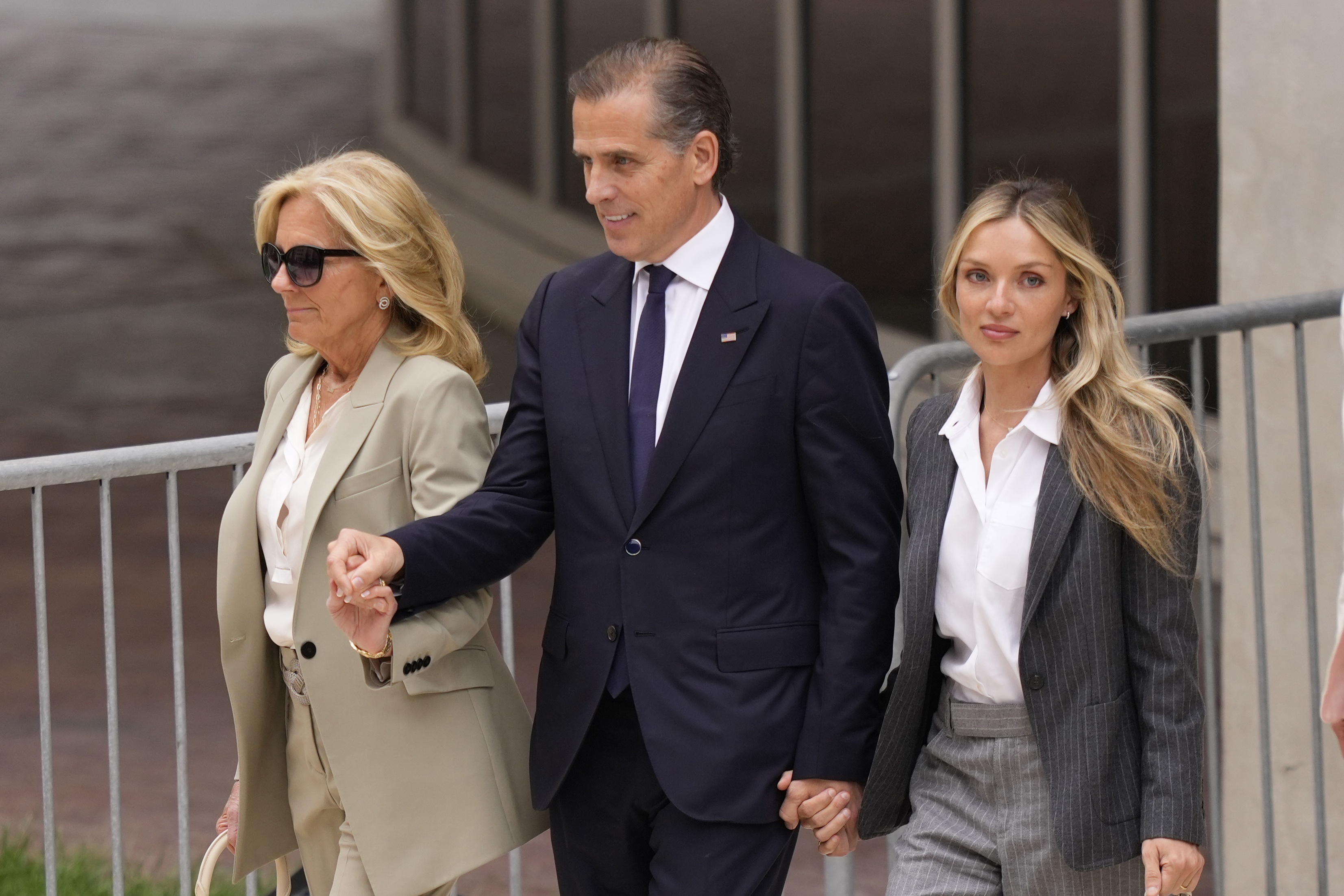 Hunter Biden, President Joe Biden&#039;s son, accompanied by his mother, First Lady Jill Biden and his wife, Melissa Cohen Biden, walks out of federal court after hearing the verdict, Tuesday, June 11, 2024, in Wilmington, Del. Hunter Biden has been convicted of all 3 felony charges in the federal gun trial.<br />(Matt Slocum / AP Photo)