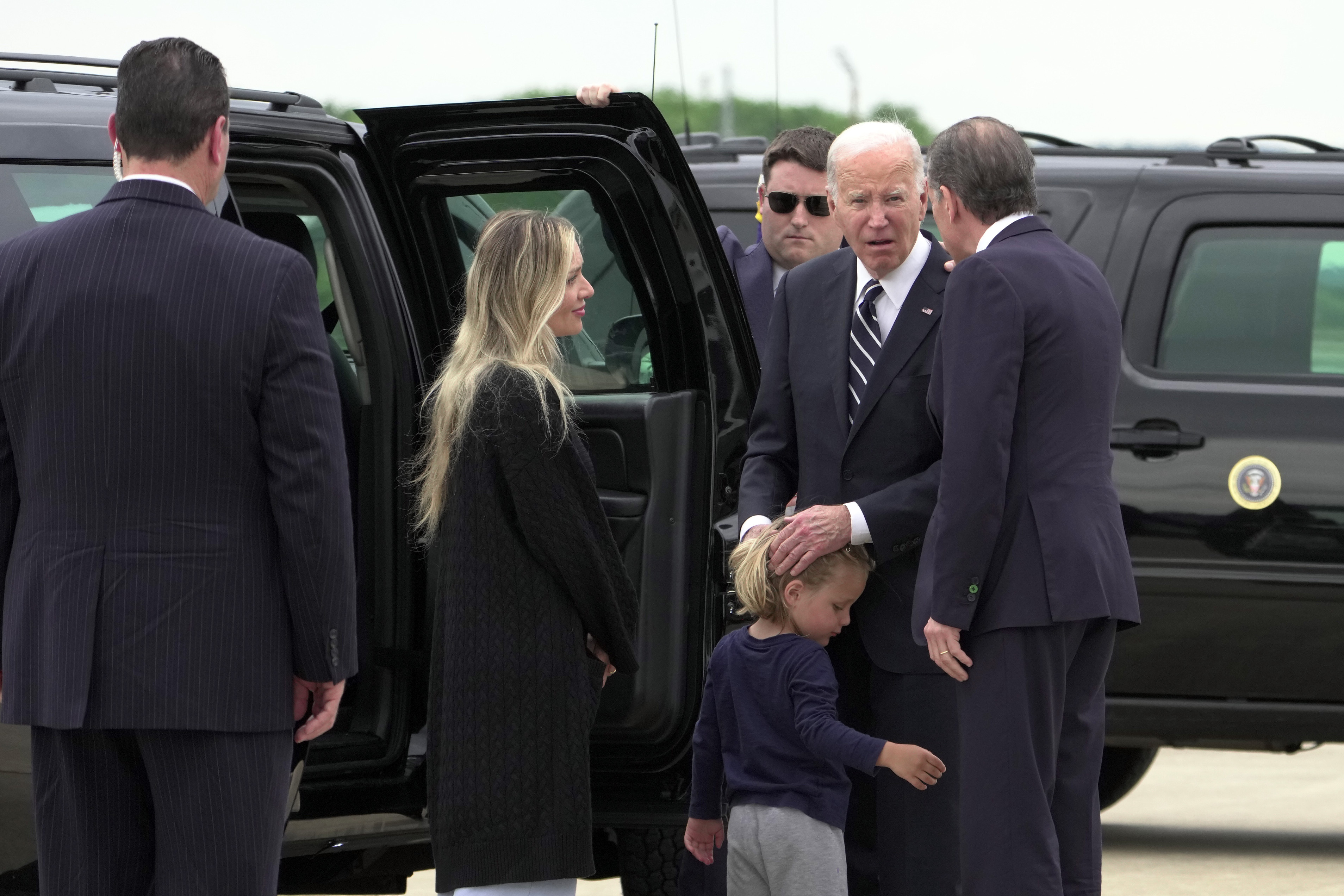 President Joe Biden talks with his son Hunter Biden and wife Melissa Cohen Biden, and grandson Beau, as he arrives at the Delaware Air National Guard Base in New Castle, Del., Tuesday, June 11, 2024.<br />(Manuel Balce Ceneta / AP Photo)