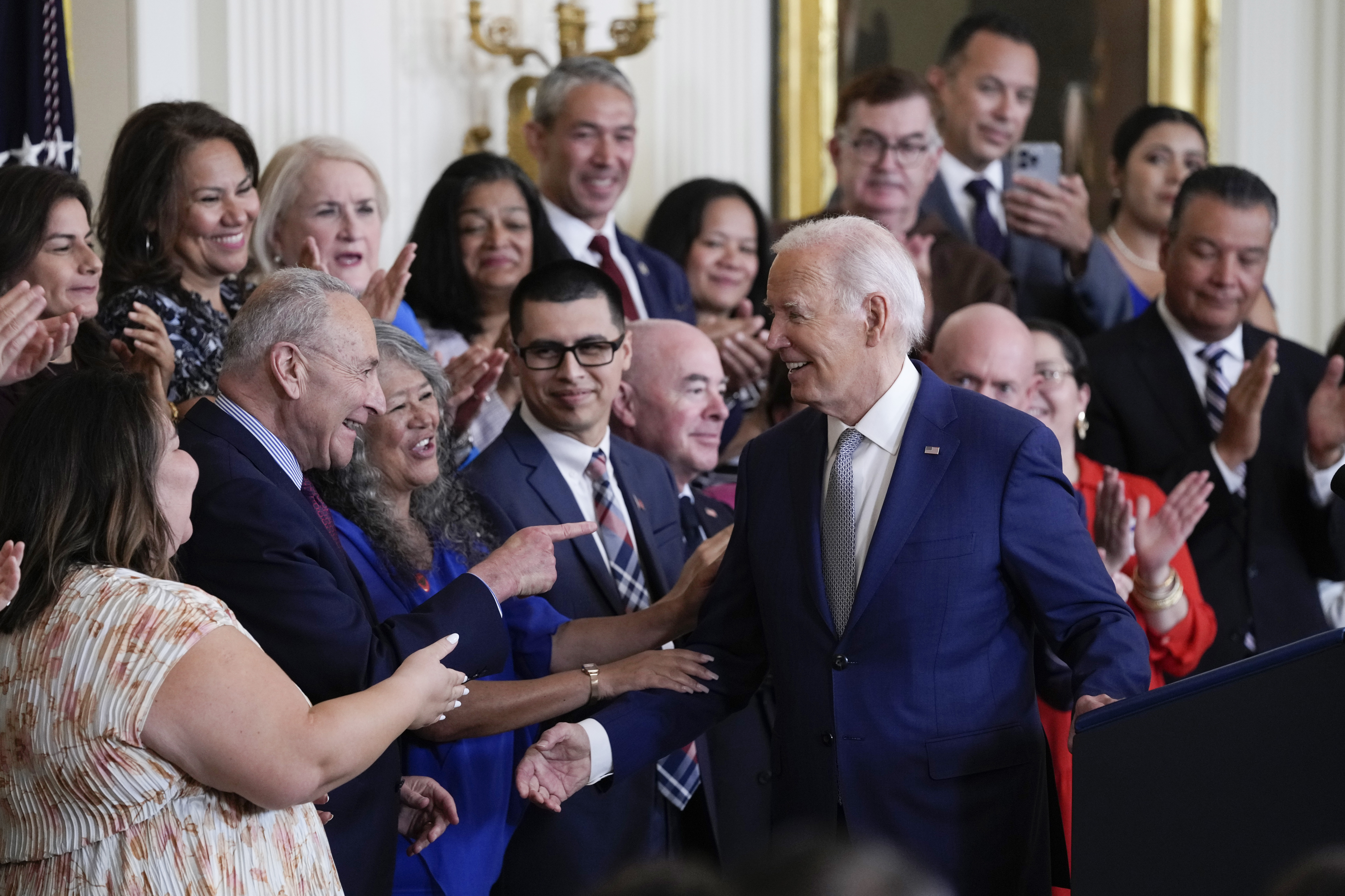 President Joe Biden turns to the others on the dais after speaking during an event marking the 12th anniversary of the Deferred Action for Childhood Arrivals program, in the East Room of the White House in Washington, Tuesday, June 18, 2024.<br />(Susan Walsh / AP Photo)