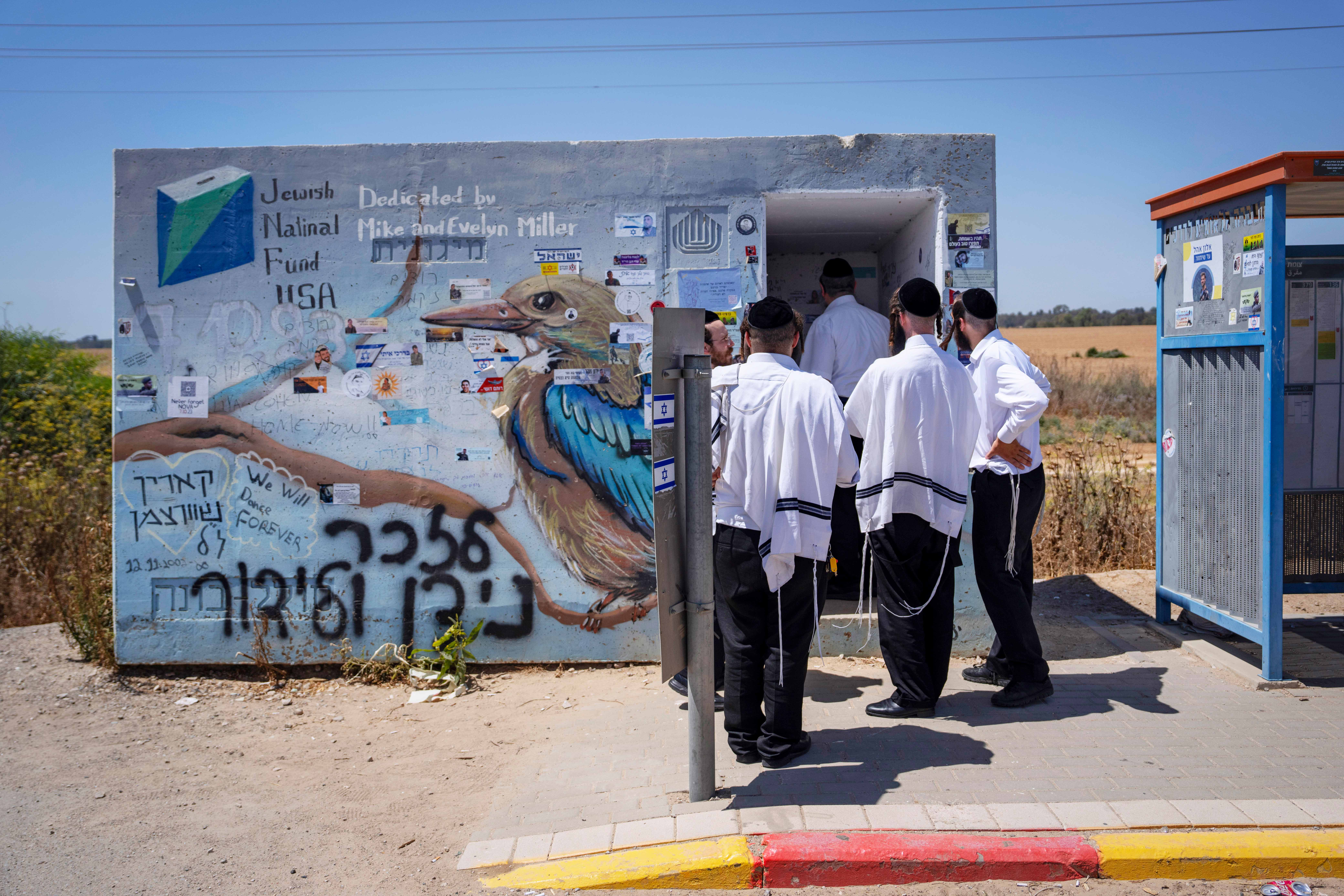 Ultra-Orthodox Jews from central Israel visit a bomb shelter where Israelis were killed during the Oct. 7 Hamas militants attack on Israel, near Kibbutz Beeri, southern Israel, on Friday, June 21, 2024.<br />(Oded Balilty / AP Photo)