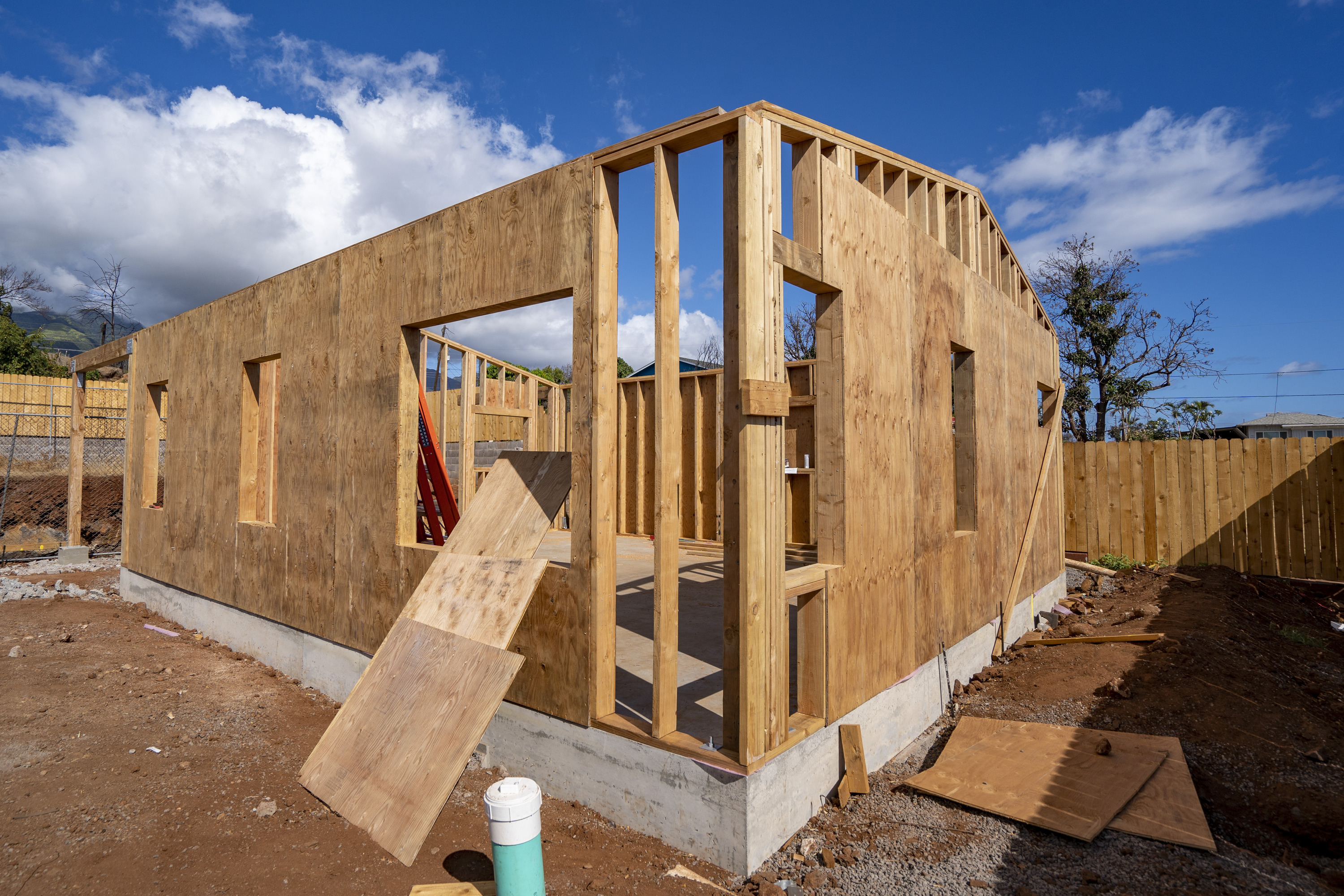 Construction has been slow in Lahaina, Hawaii, where most of the town burned in a wildfire in 2023. This property, shown in July 2024, was one of the first where rebuilding could begin because the home had been under construction before the fire and still had open permits.<br />(Mengshin Lin / AP Photo)