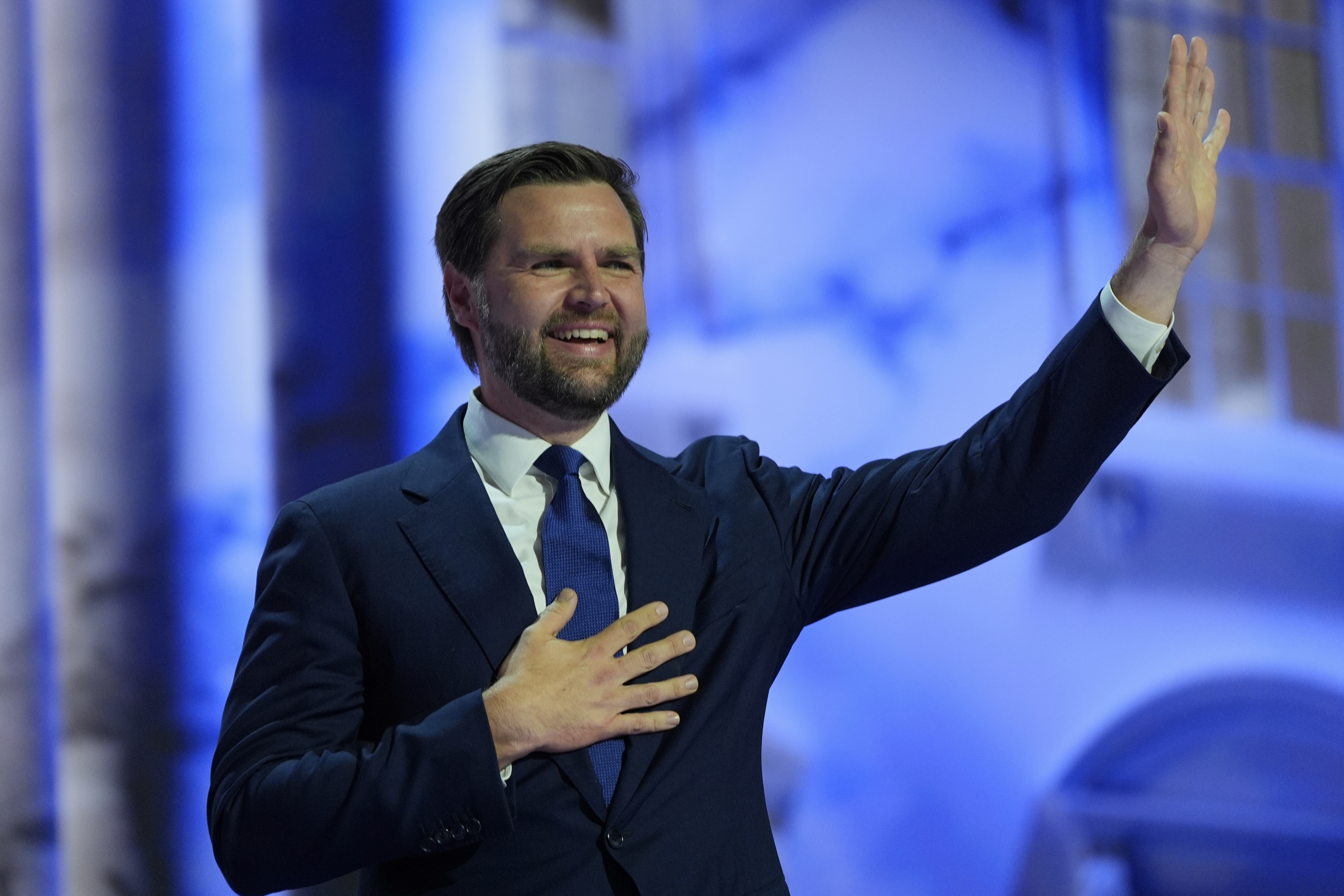 Vice Presidential Nominee Sen. JD Vance waves during the Republican National Convention Wednesday, July 17, 2024, in Milwaukee.<br />(Julia Nikhinson / AP Photo)