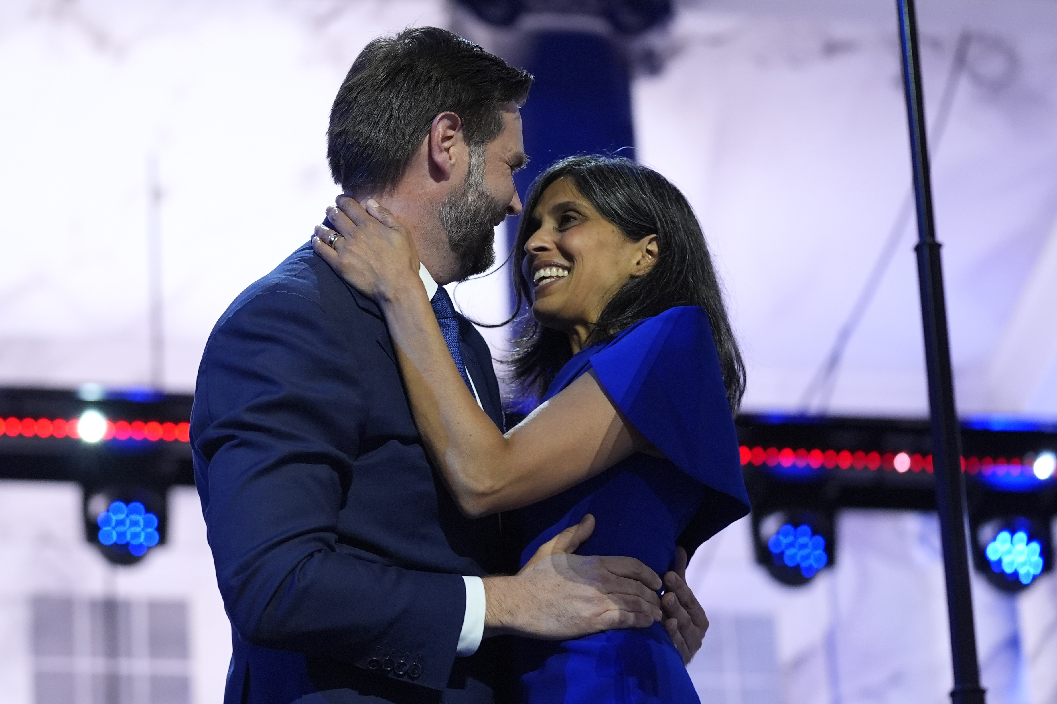 Republican vice presidential candidate Sen. JD Vance, R-Ohio, hugs his wife Usha Chilukuri Vance after speaking on third day of the Republican National Convention at the Fiserv Forum, Wednesday, July 17, 2024, in Milwaukee.<br />(Evan Vucci / AP Photo)
