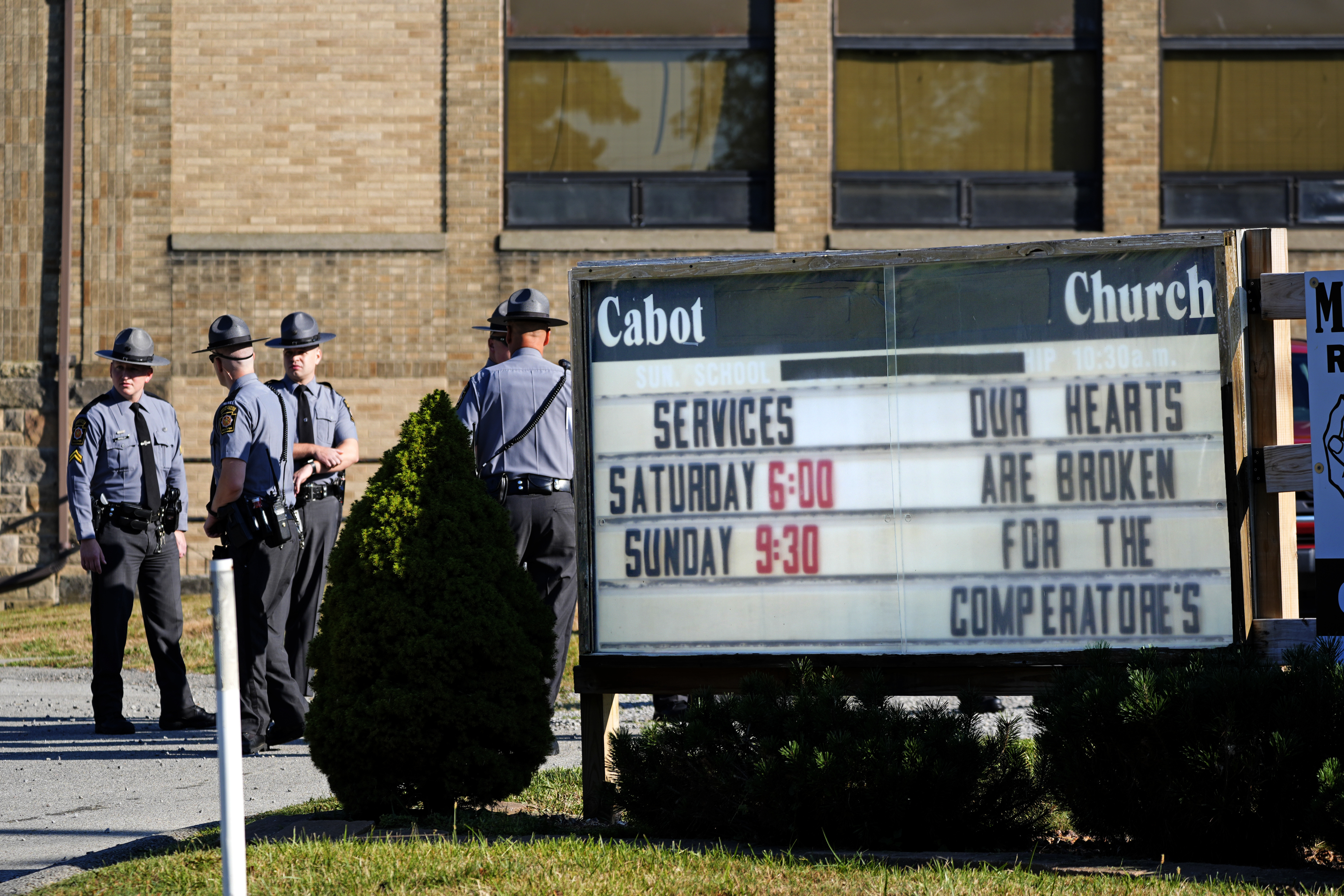 Pennsylvania State Police arrive at the Cabot Church, in Cabot, Pa., Friday, July 19, 2024, before the funeral service for Buffalo Township Volunteer fireman Corey Comperatore, who was killed at a Pennsylvania rally for Donald Trump, Saturday, July 13, 2024.<br />(Gene J. Puskar / AP Photo)