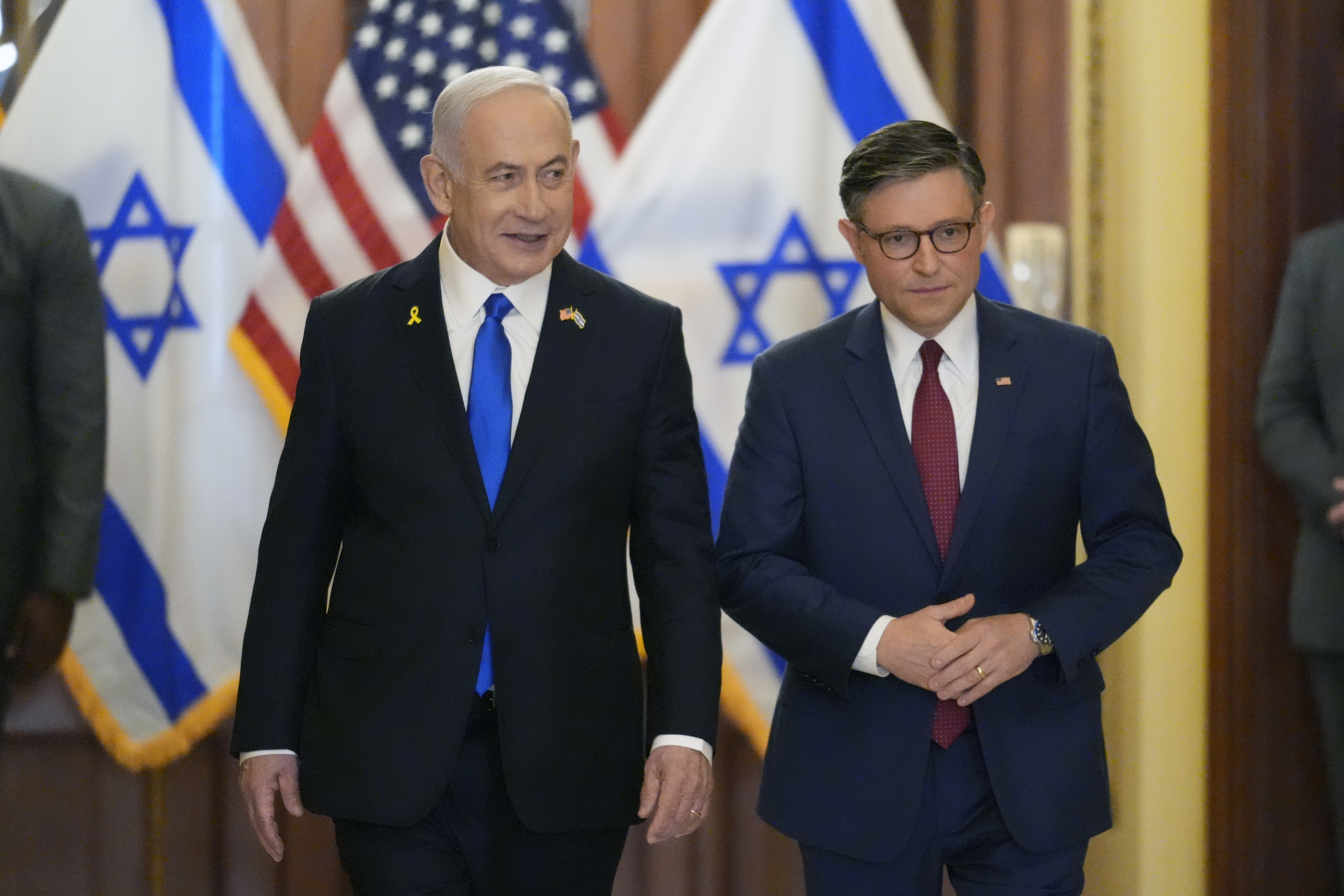 Israeli Prime Minister Benjamin Netanyahu is welcomed by Speaker of the House Mike Johnson, R-La., to the Capitol in Washington, Wednesday, July 24, 2024. Netanyahu wants to boost U.S. support during his speech to Congress but faces protests and lawmaker boycotts.<br />(J. Scott Applewhite / AP Photo)