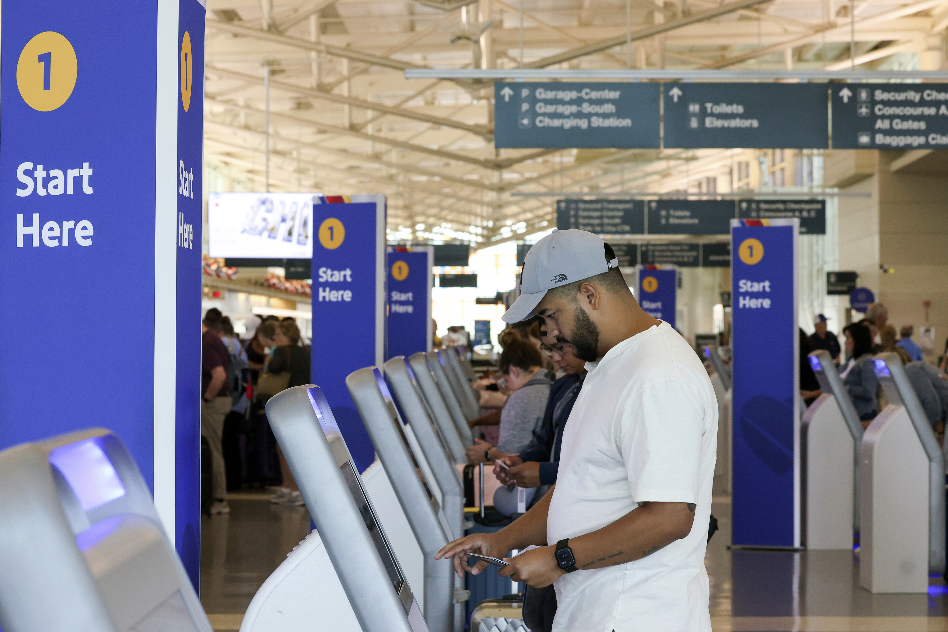 A passenger checks in for his Southwest Airlines flight at Midway International Airport in Chicago, Thursday, July 25, 2024.<br />(Teresa Crawford / AP Photo)