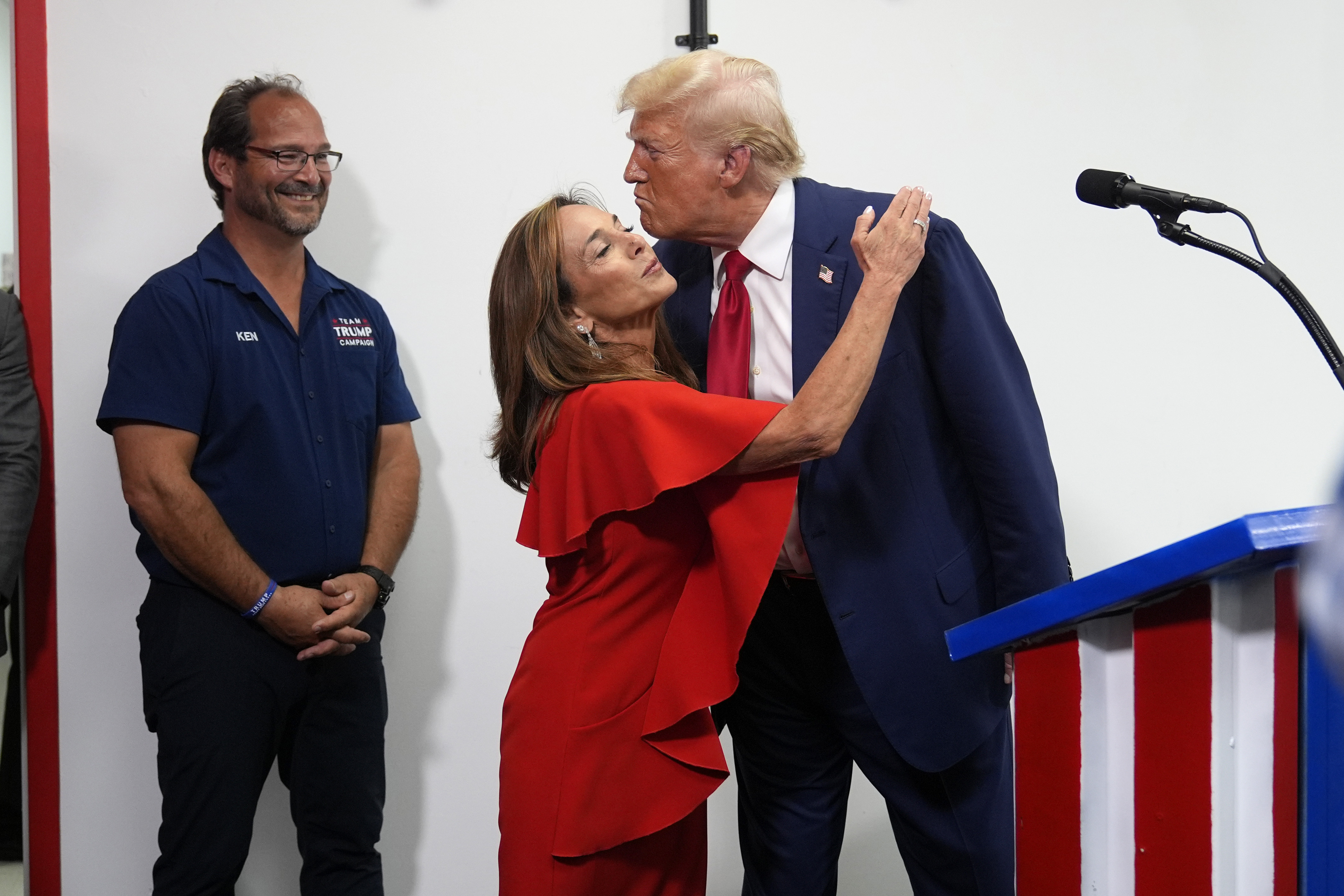 Rep. Lisa McClain, R-Mich. hugs President-elect Donald Trump during a stop at a campaign office, Monday, Aug. 26, 2024, in Roseville, Mich.<br />(Carolyn Kaster / AP Photo)