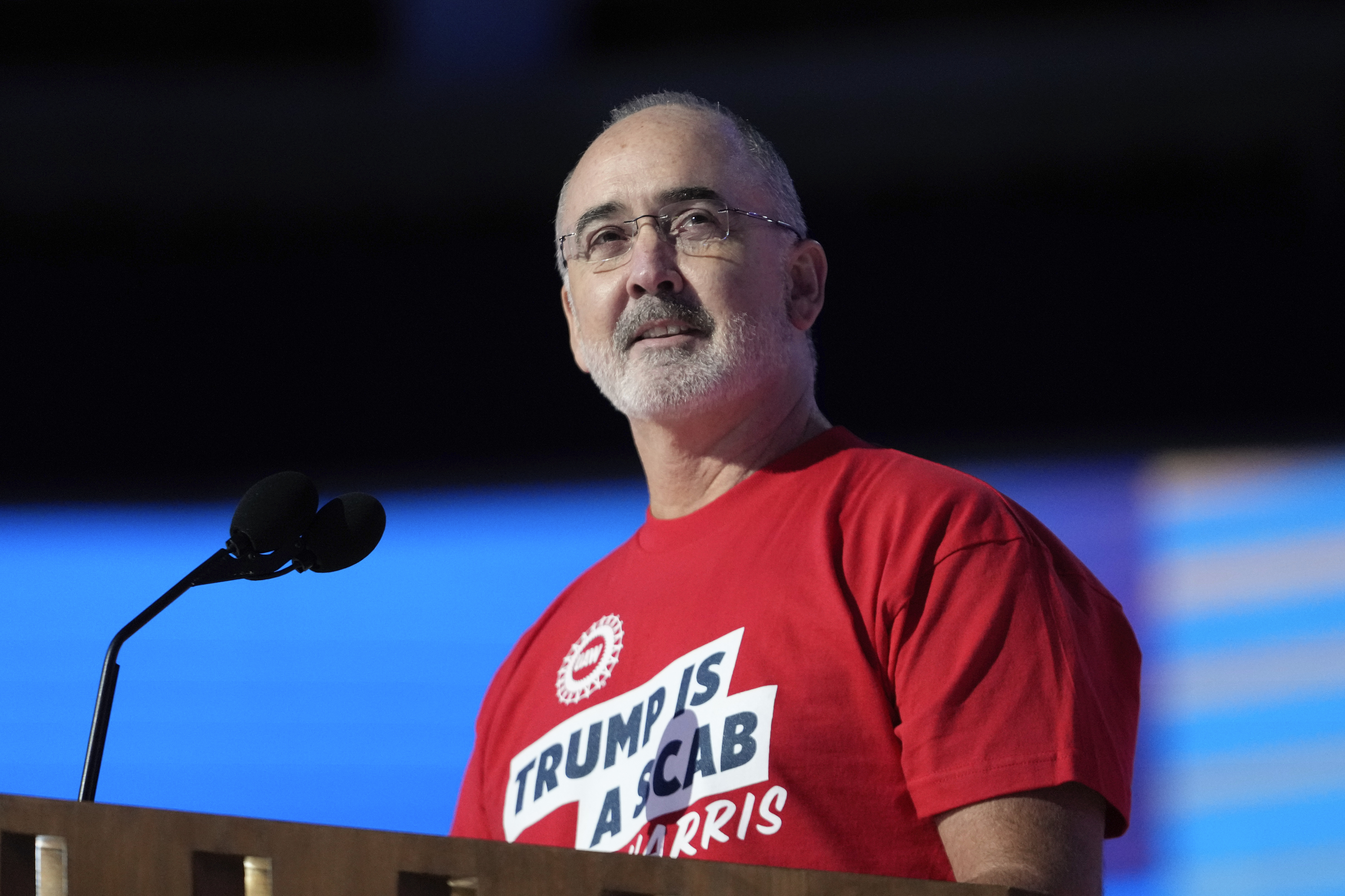 Shawn Fain, president of the United Automobile Workers, speaks during the Democratic National Convention Monday, Aug. 19, 2024, in Chicago.<br />(Paul Sancya / AP Photo)