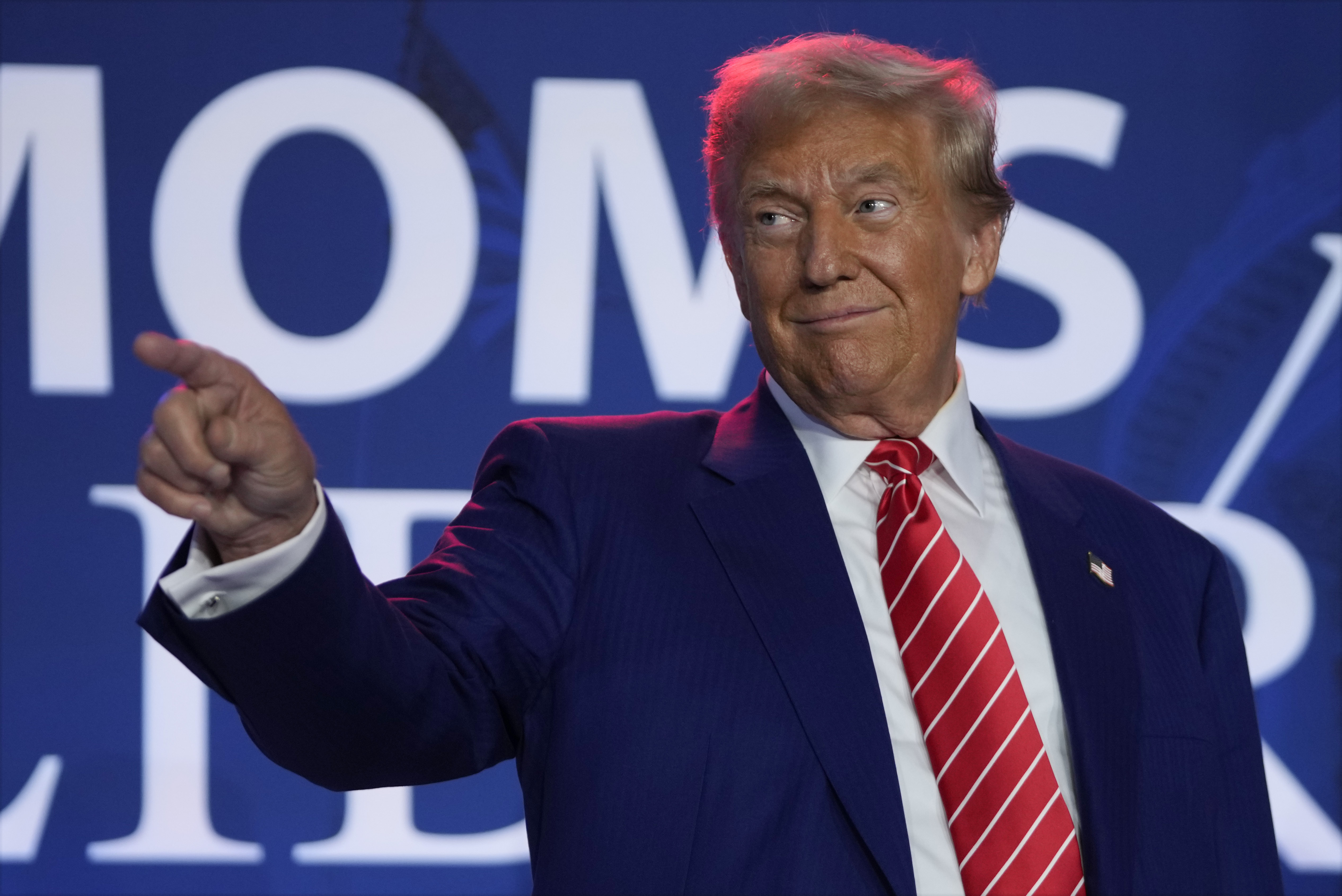 Republican presidential nominee former President Donald Trump arrives to speak with Moms for Liberty co-founder Tiffany Justice during an event at the group&#039;s annual convention in Washington, Friday, Aug. 30, 2024.<br /> (Mark Schiefelbein / AP Photo)